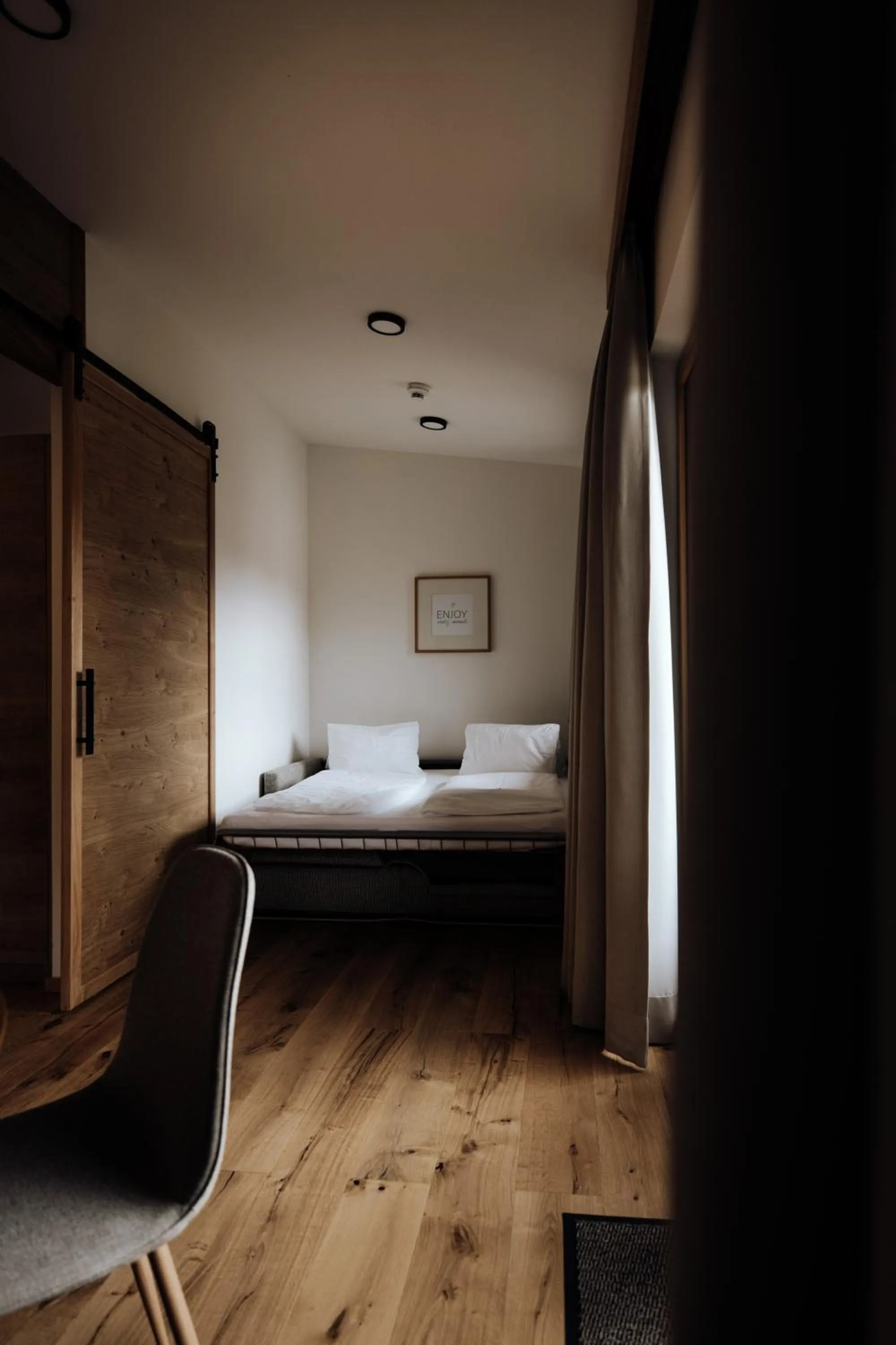 Living room, Bed in FORSTAUERWiRT Hotel & Restaurant