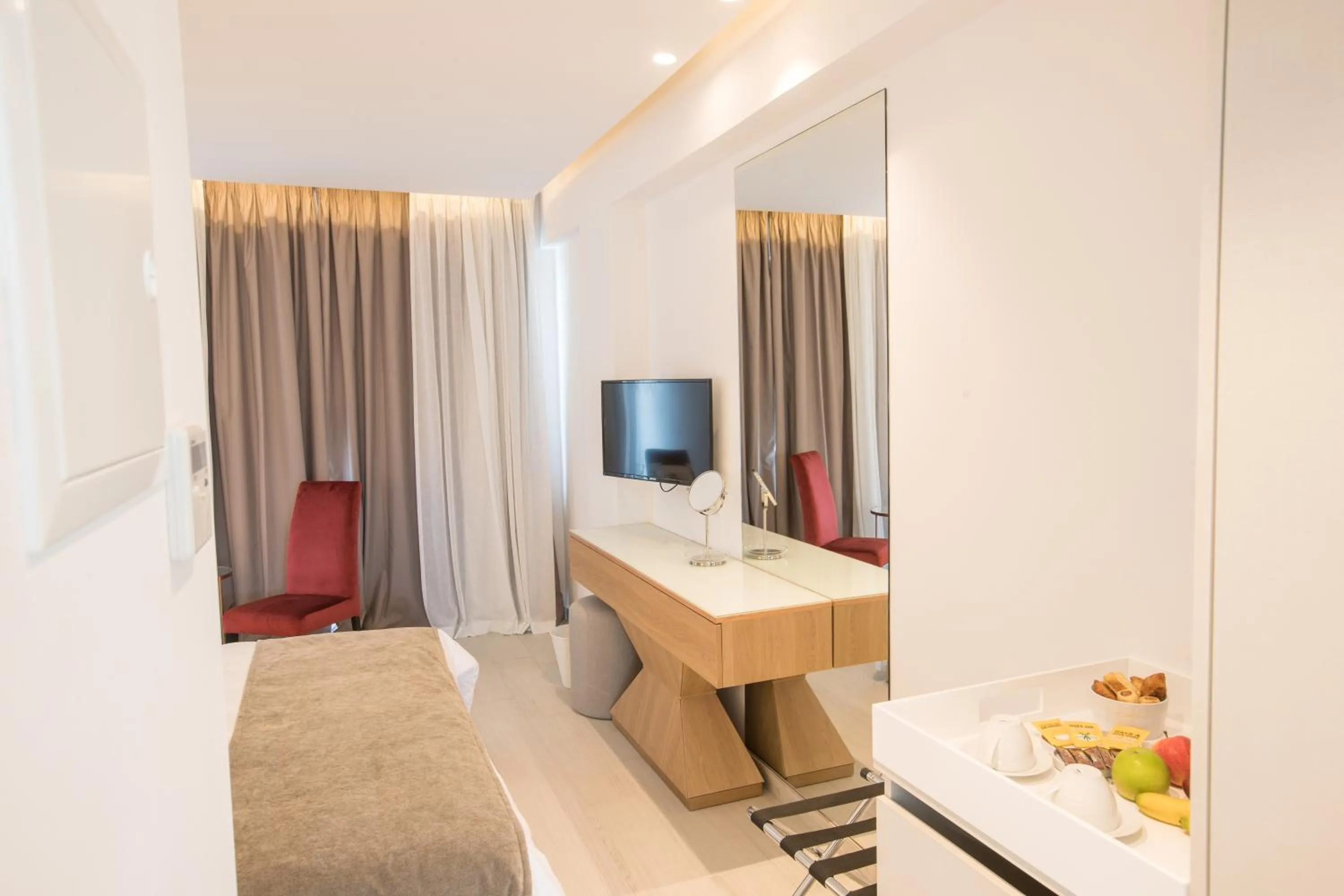 TV and multimedia, Bed in Kokkinos Boutique Hotel