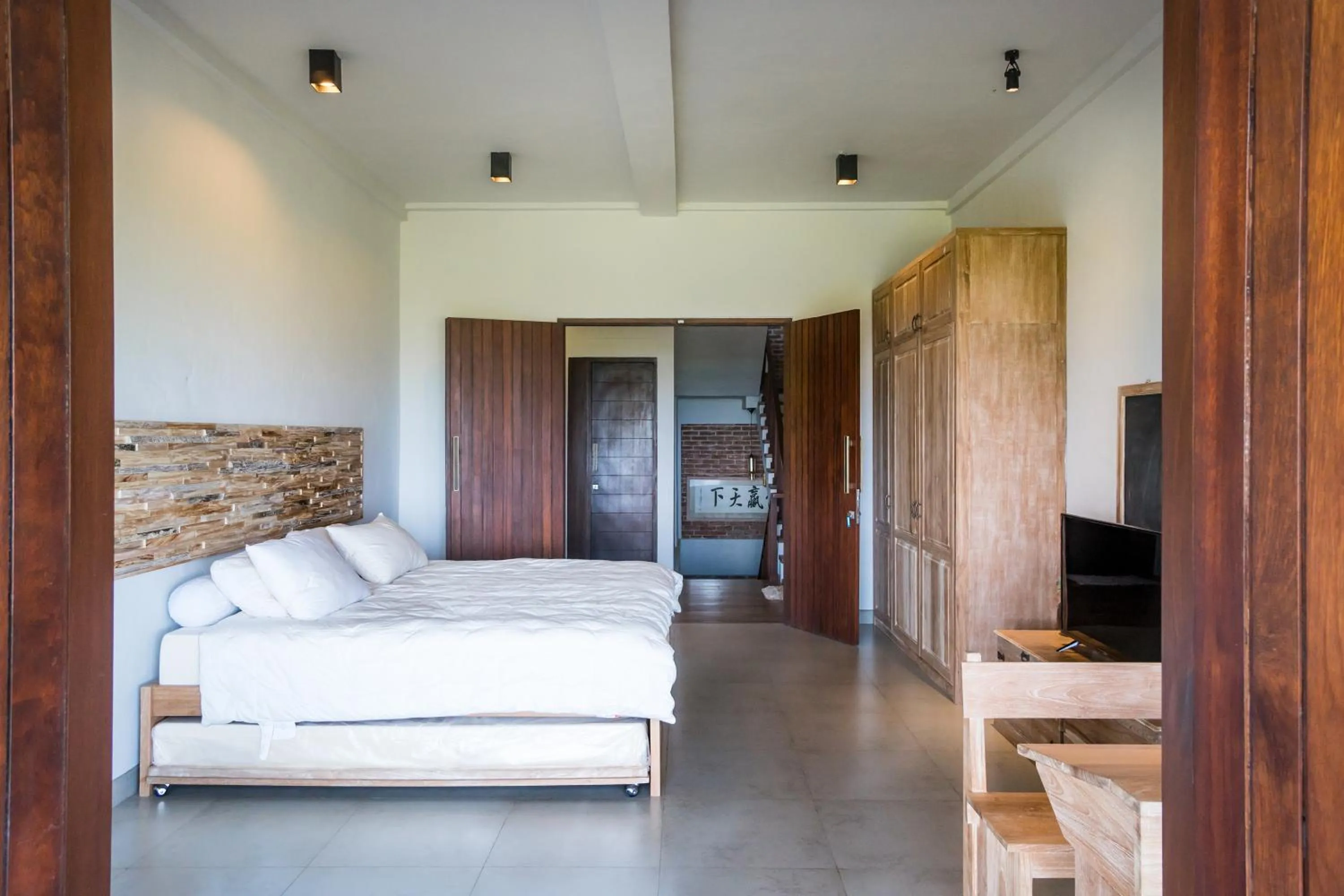 Bed in The Ocean Views Luxury Villas & Apartment