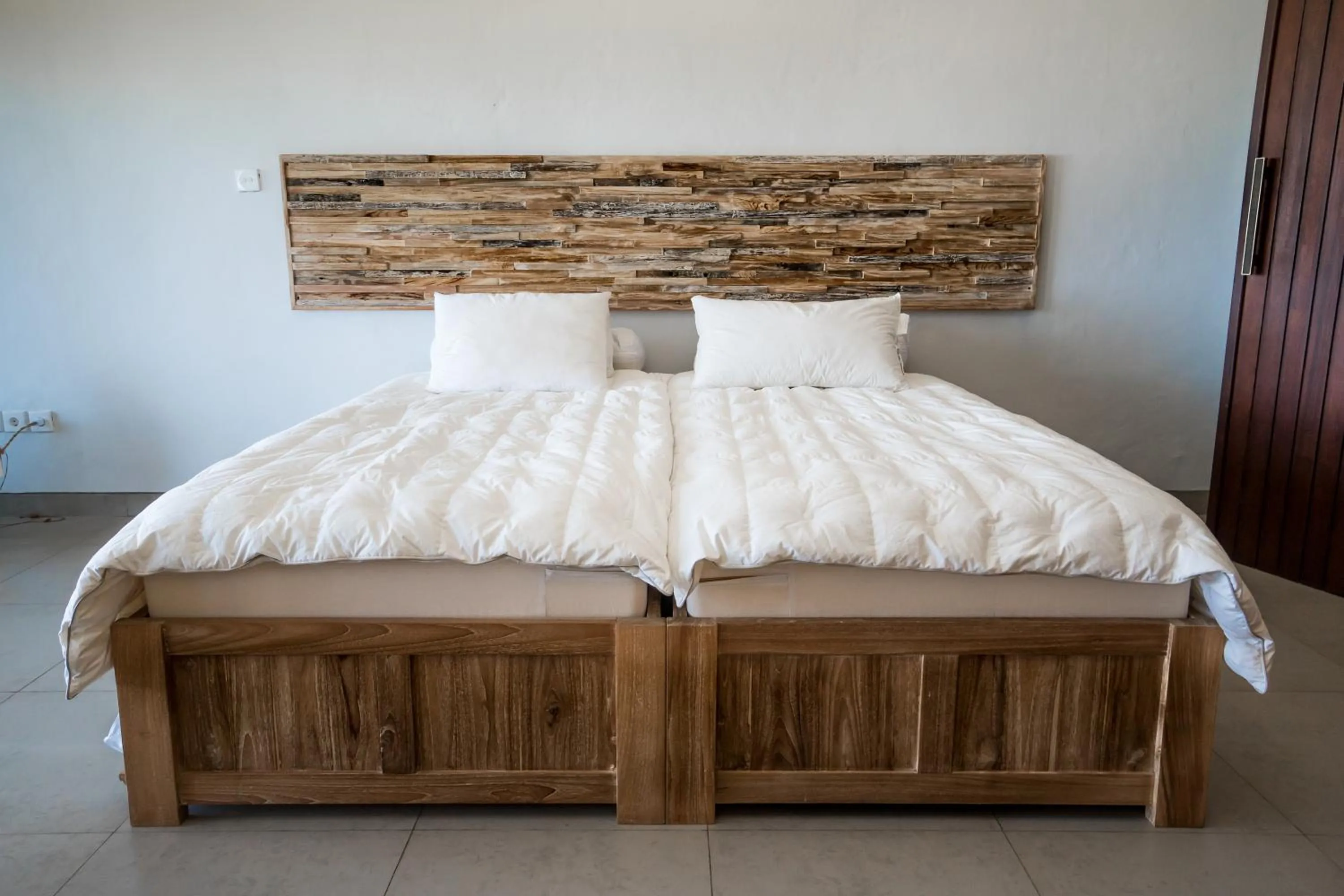 Bed in The Ocean Views Luxury Villas & Apartment