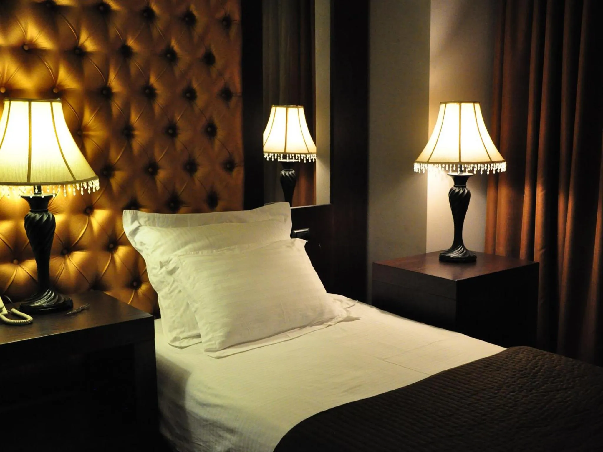 Living room, Bed in Hotel Doro City