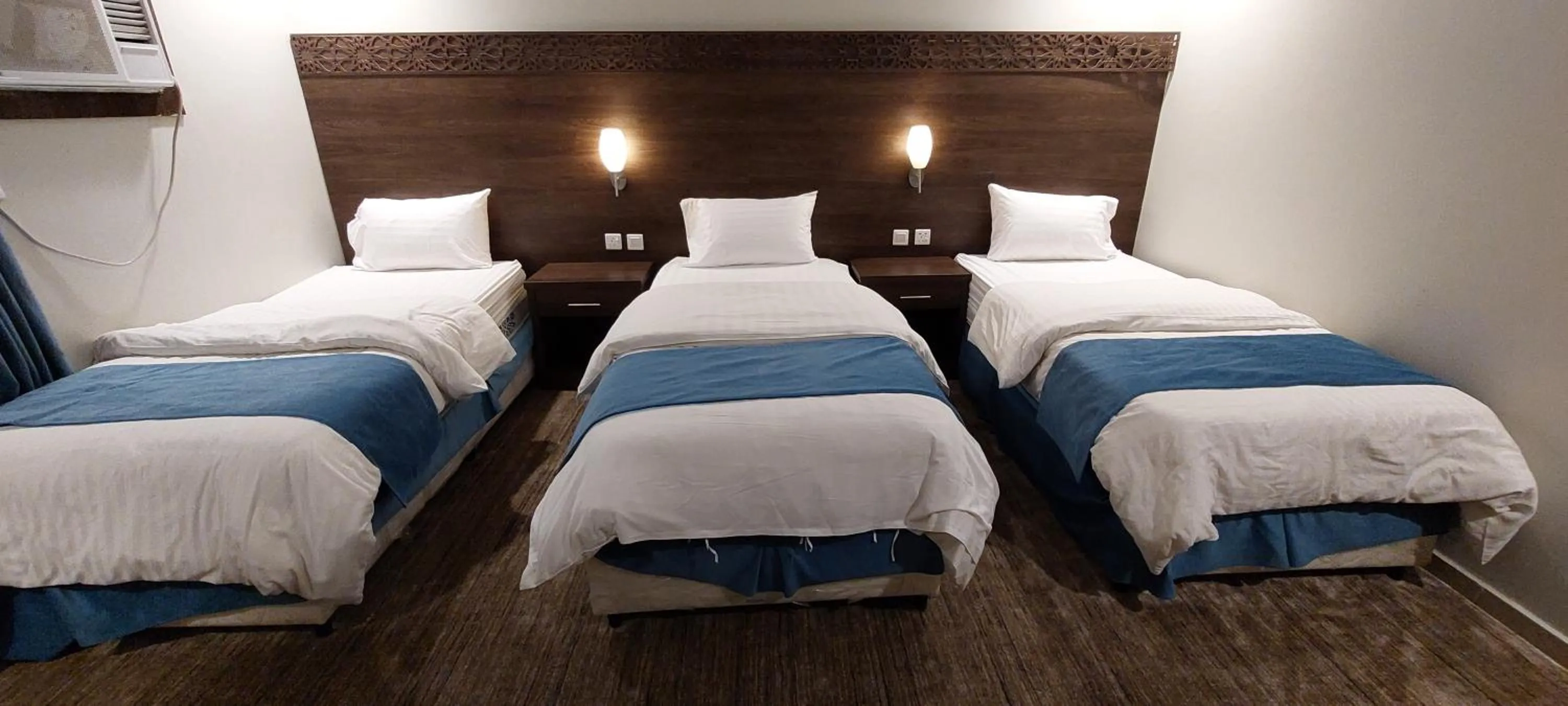 Basic Triple Room in شقق همم للشقق المخدومة