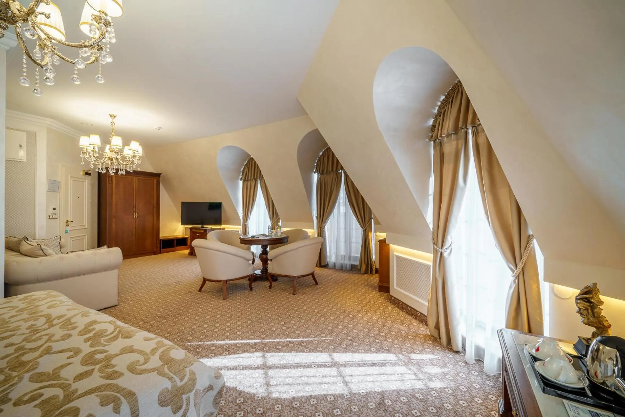 Living room, Bed in Residence City Garden - Certificate of Excellence Top 10 BEST Five-Stars City Hotels for 2024 awarded by HTIF