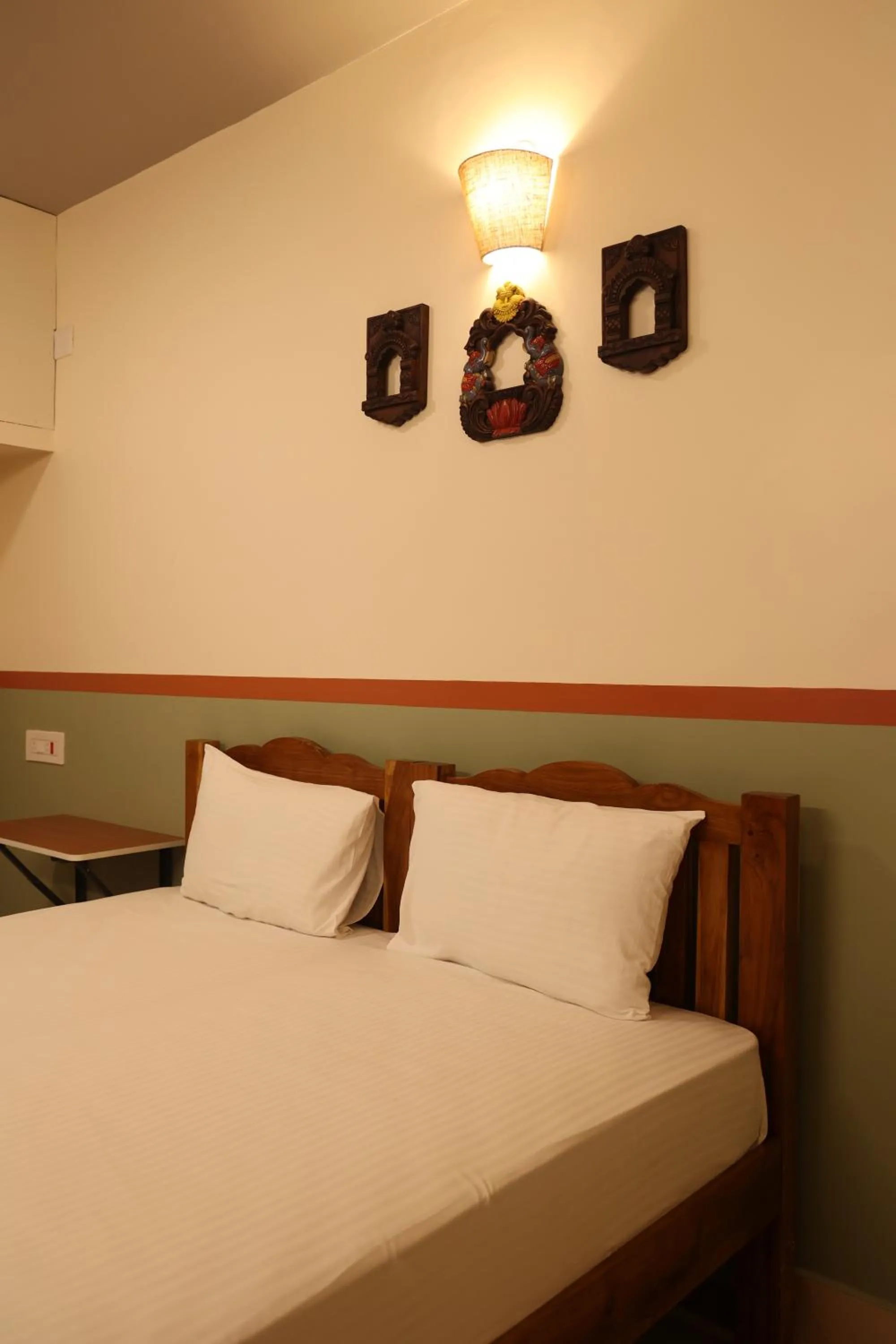 Bed in Dwaraka Guest House