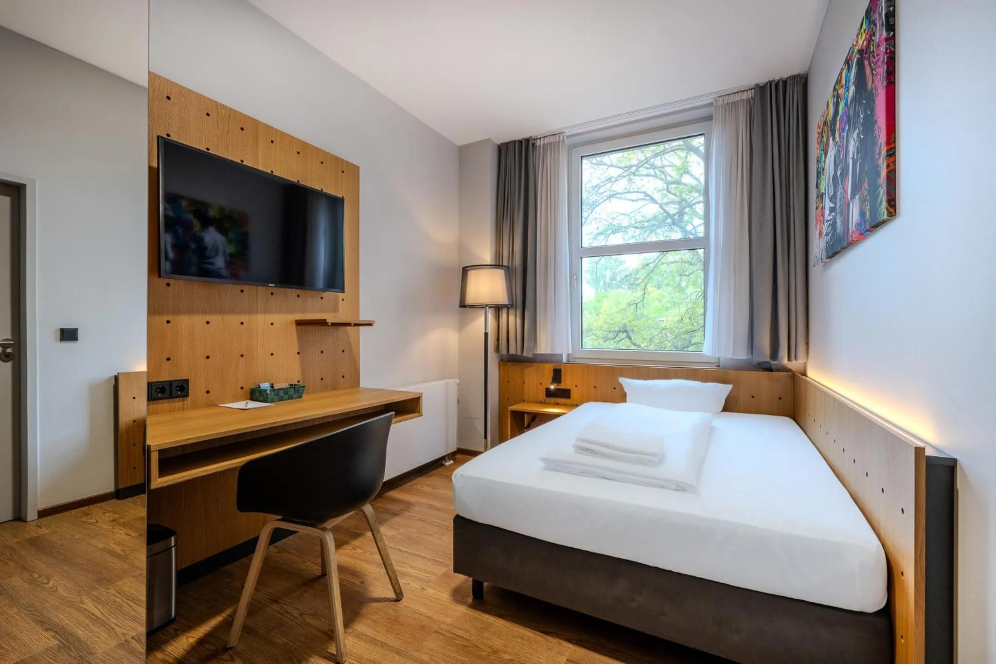 Photo of the whole room, Bed in mk hotel berlin