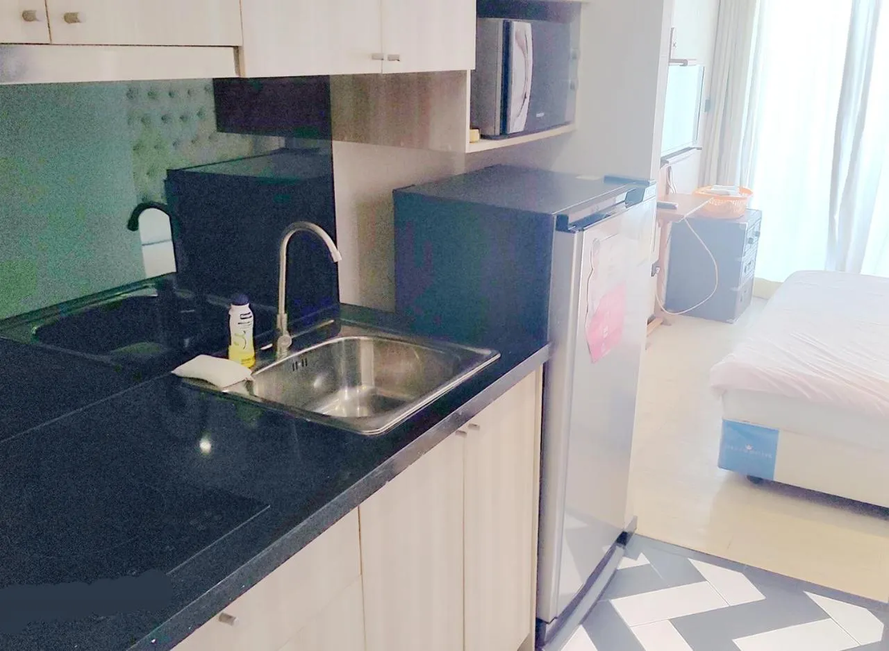 Kitchen or kitchenette in Venetian Poseidon Pool Hotel