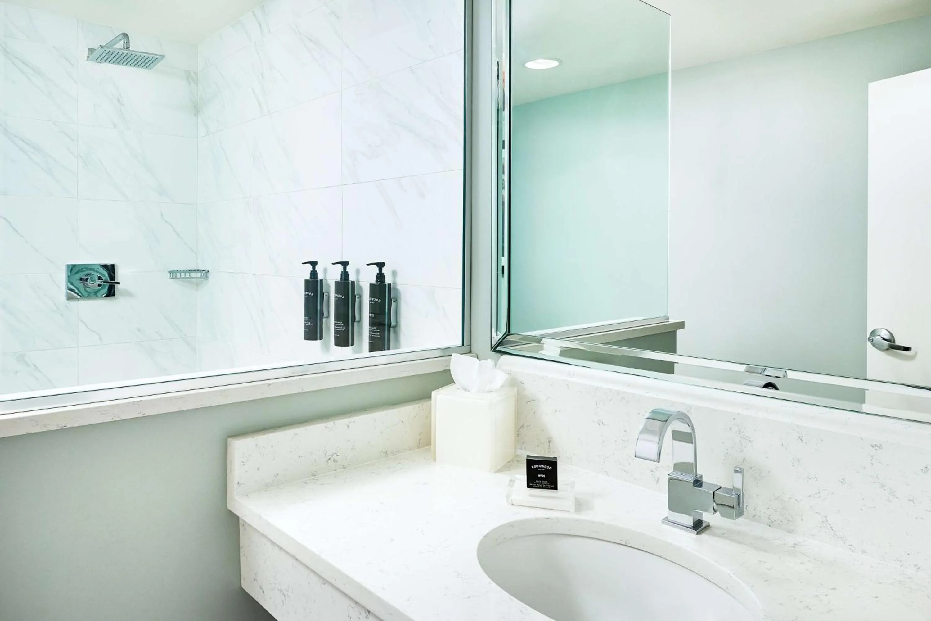 Bathroom in Redmont Hotel Birmingham - Curio Collection by Hilton