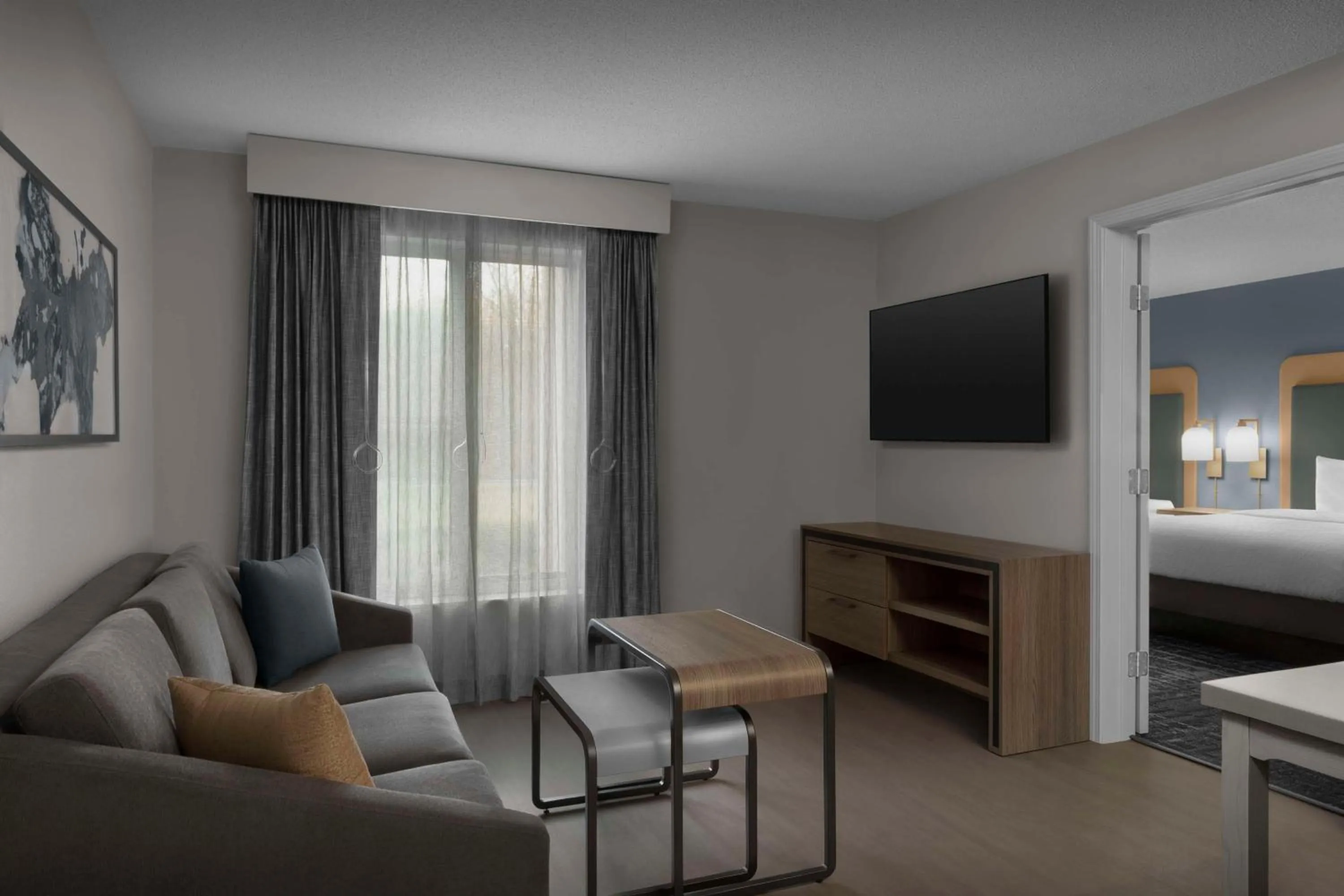 Living room, Bed in Homewood Suites Nashville Airport