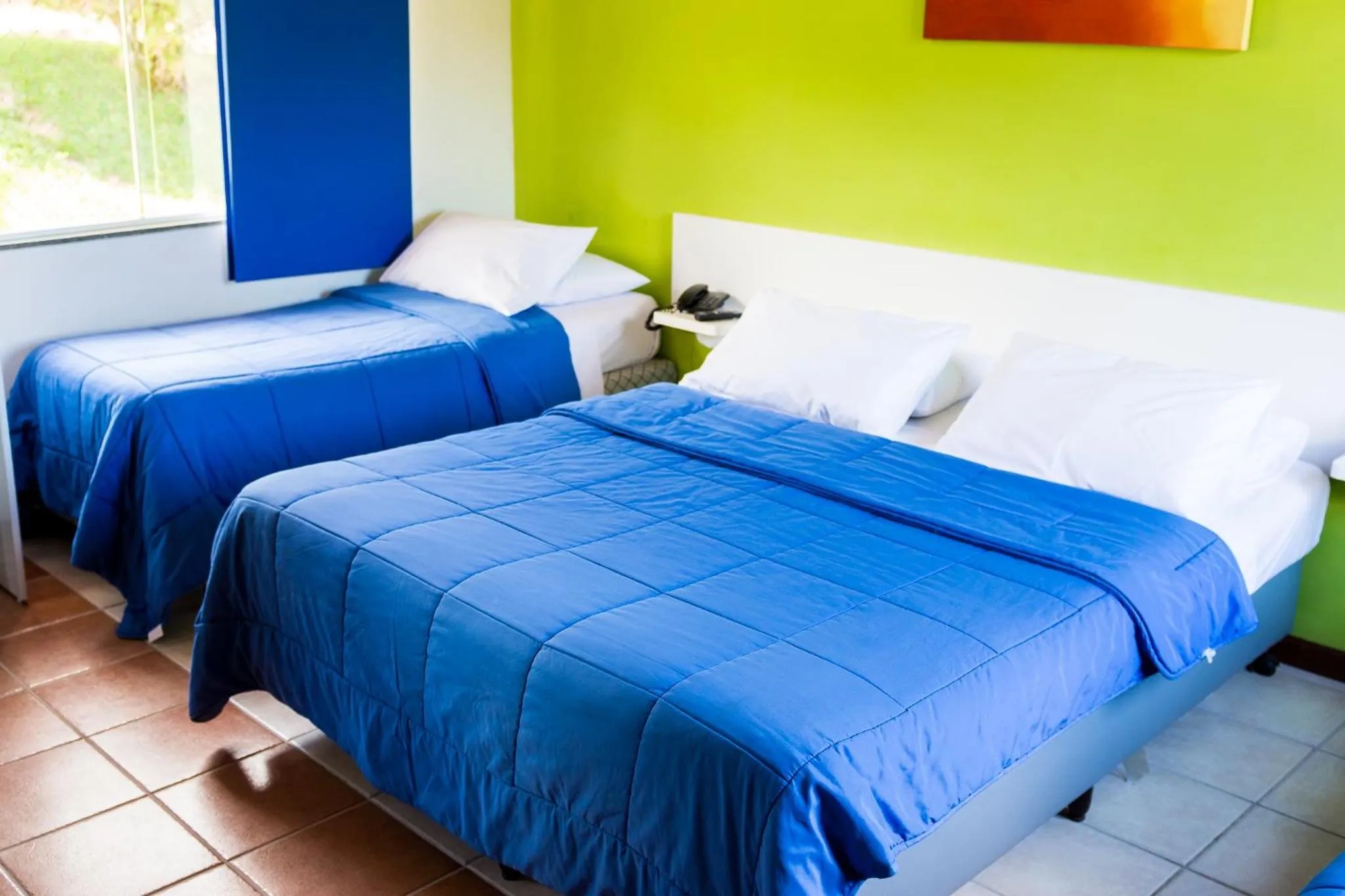 Bed in Pousada Suarez