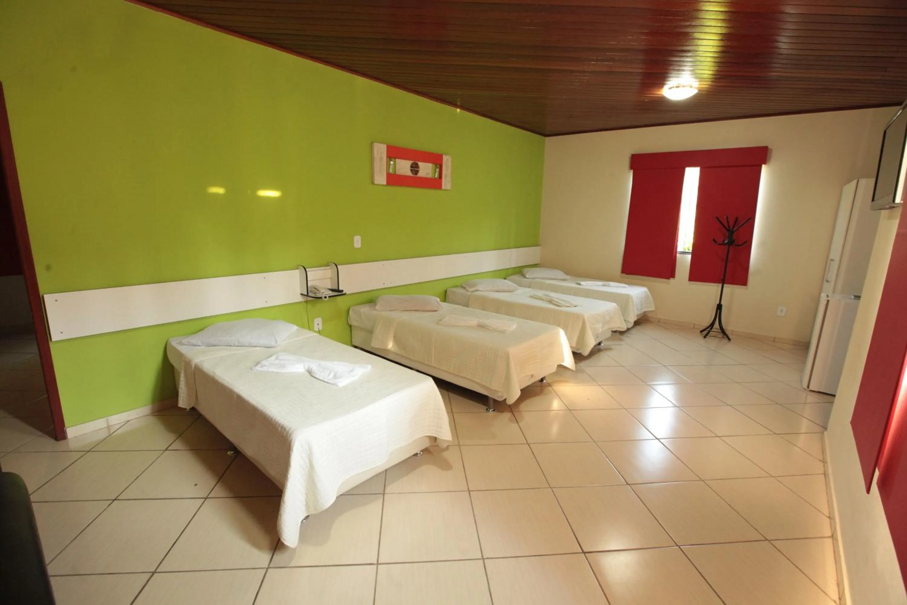 Bed in Pousada Suarez