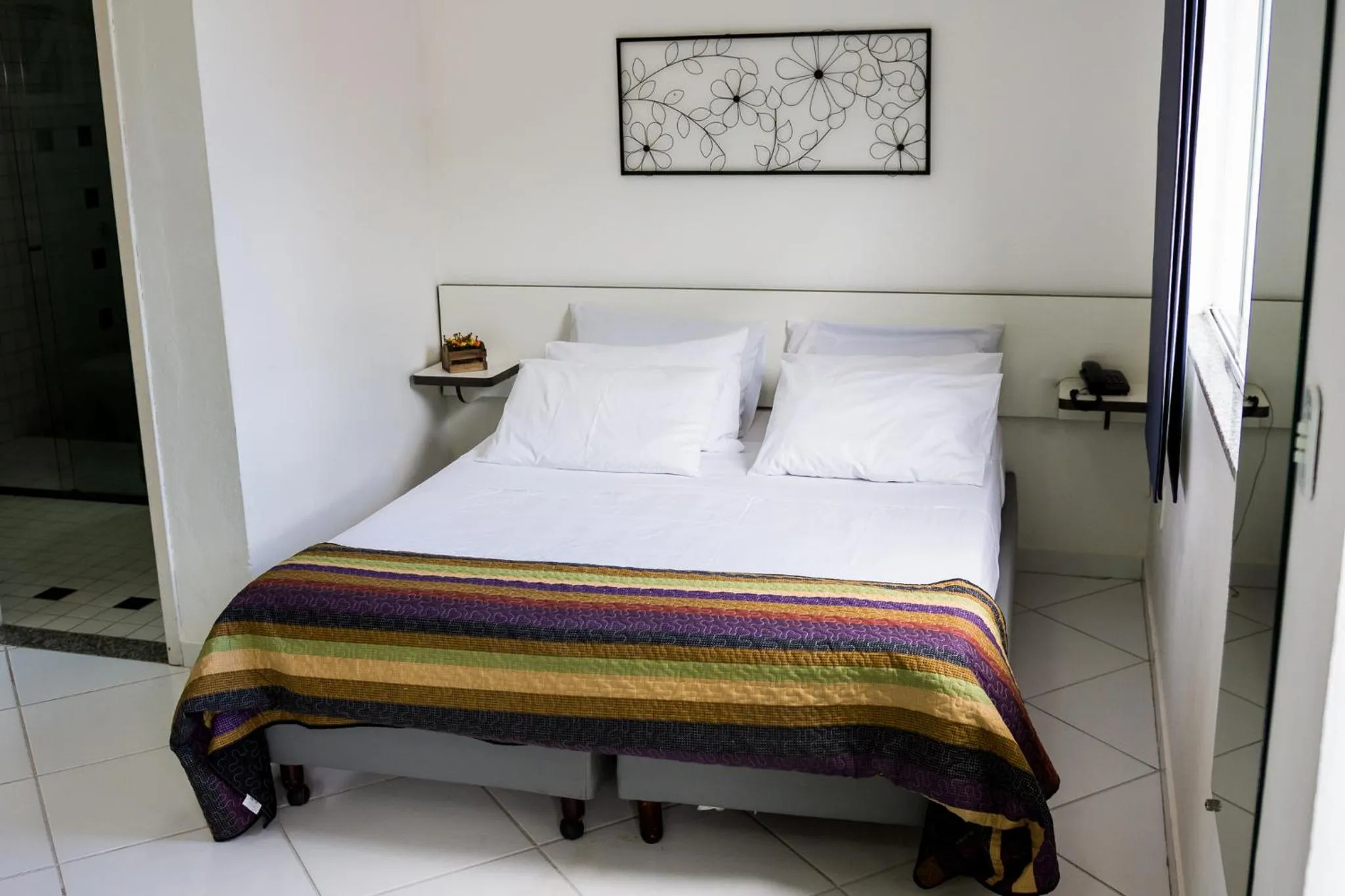 Bed in Pousada Suarez