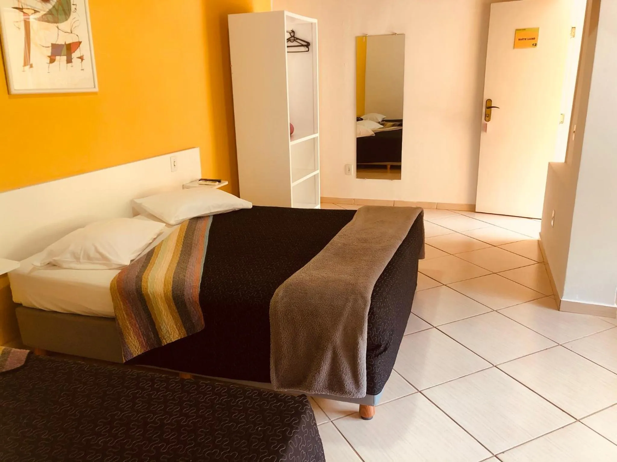 Bed in Pousada Suarez