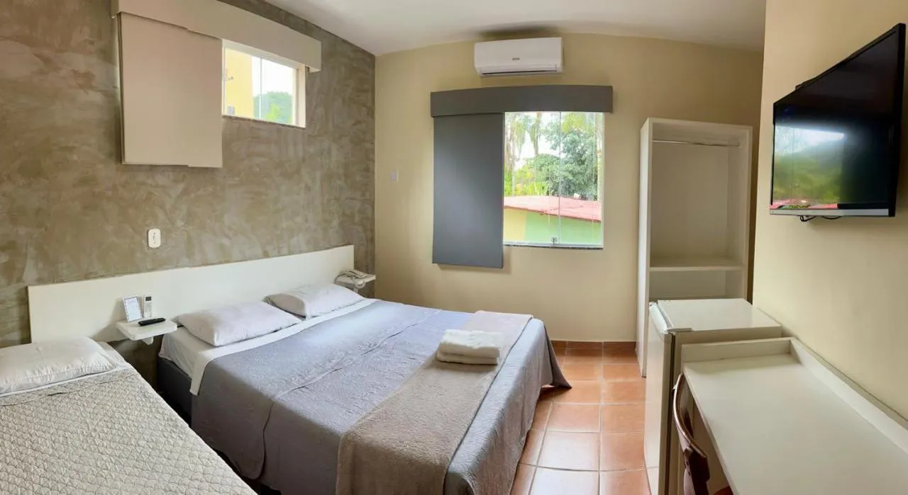 Bed in Pousada Suarez