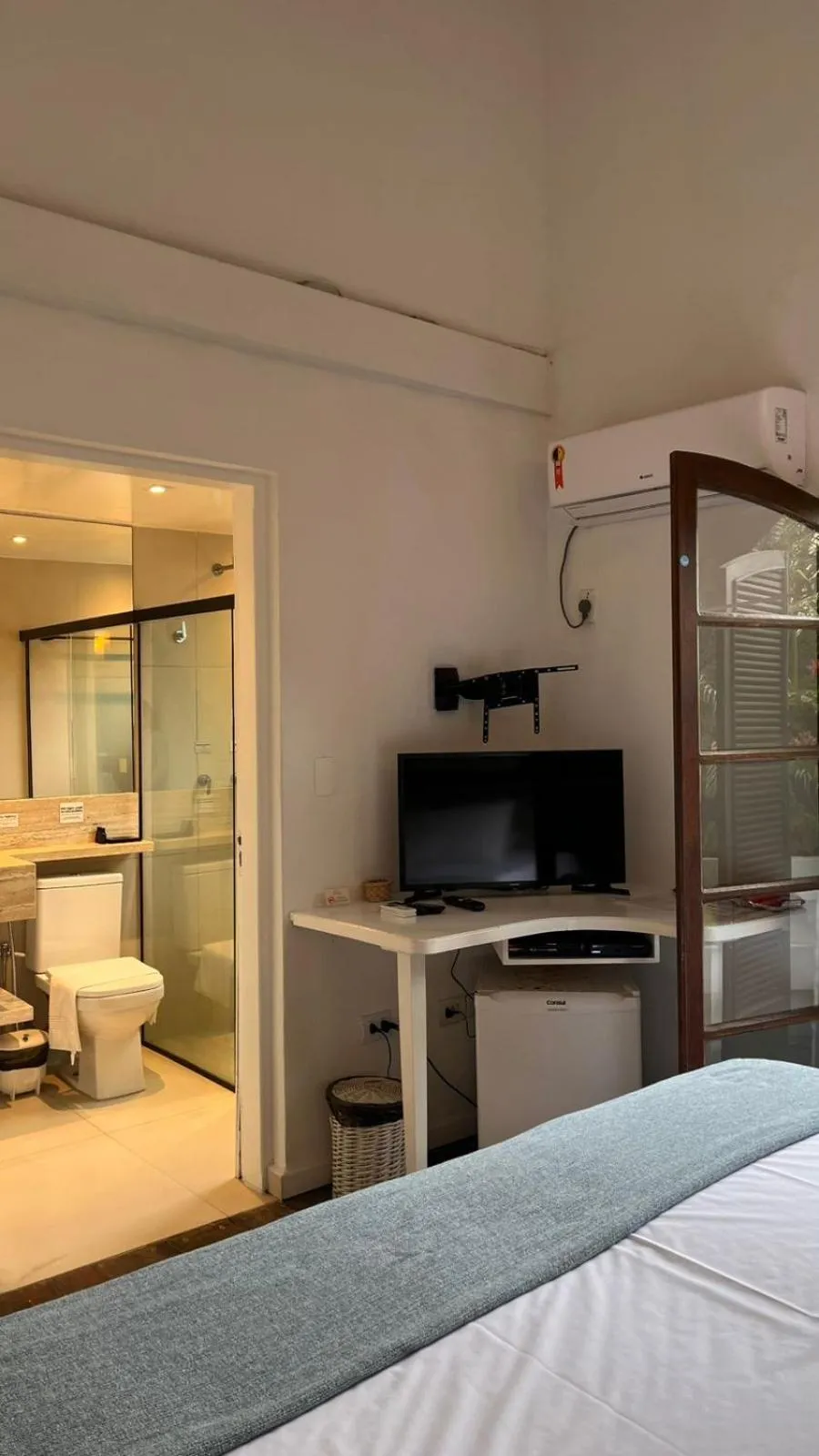 Bed in Pousada Canto do Camburi