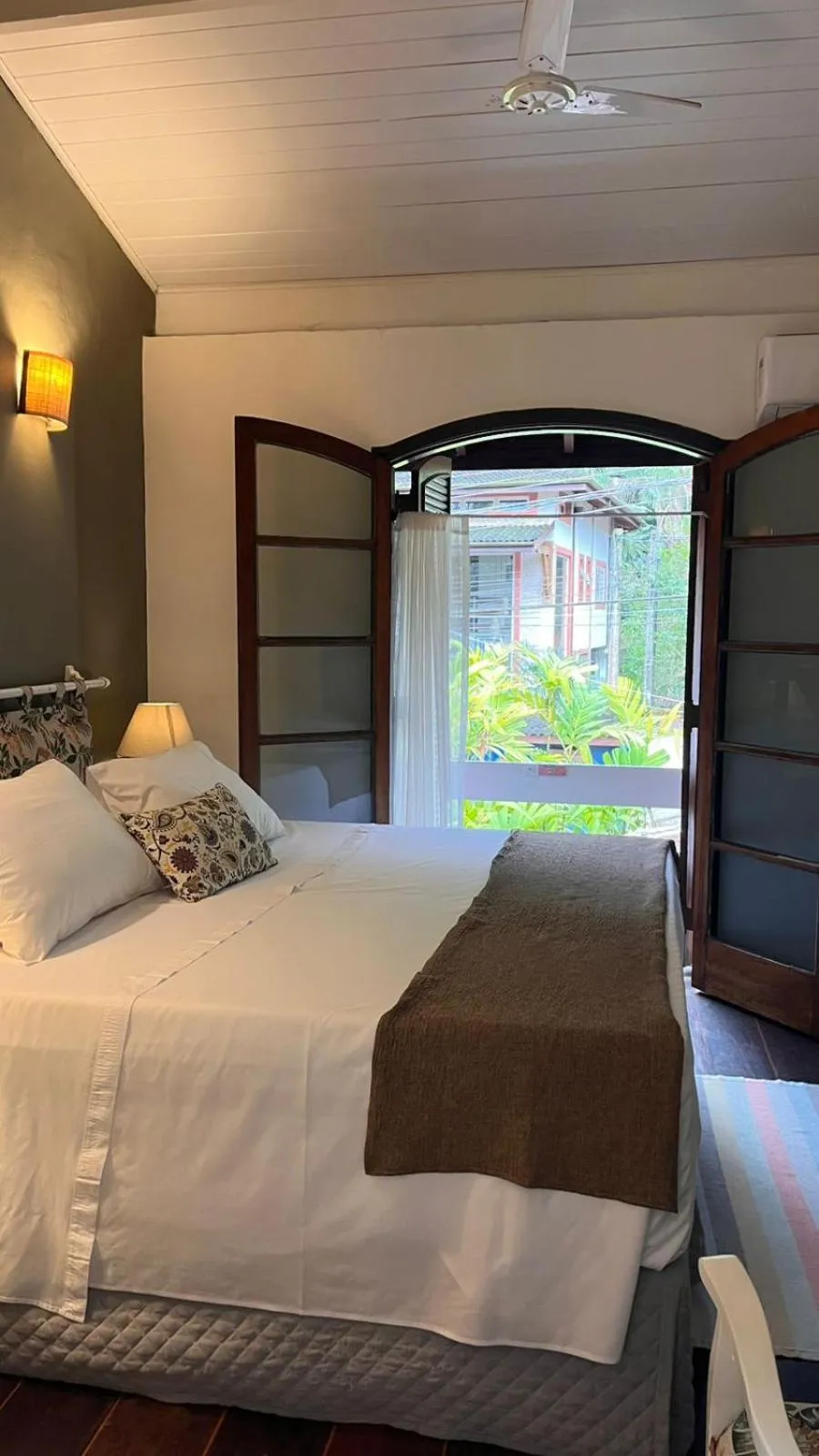 Bed in Pousada Canto do Camburi