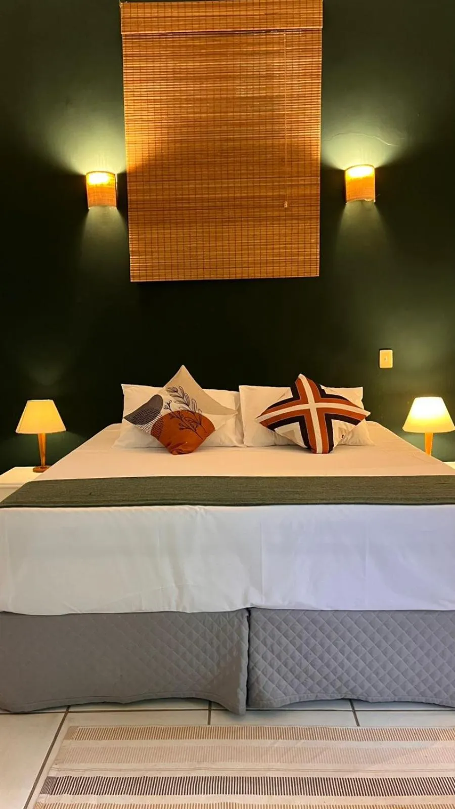 Bed in Pousada Canto do Camburi