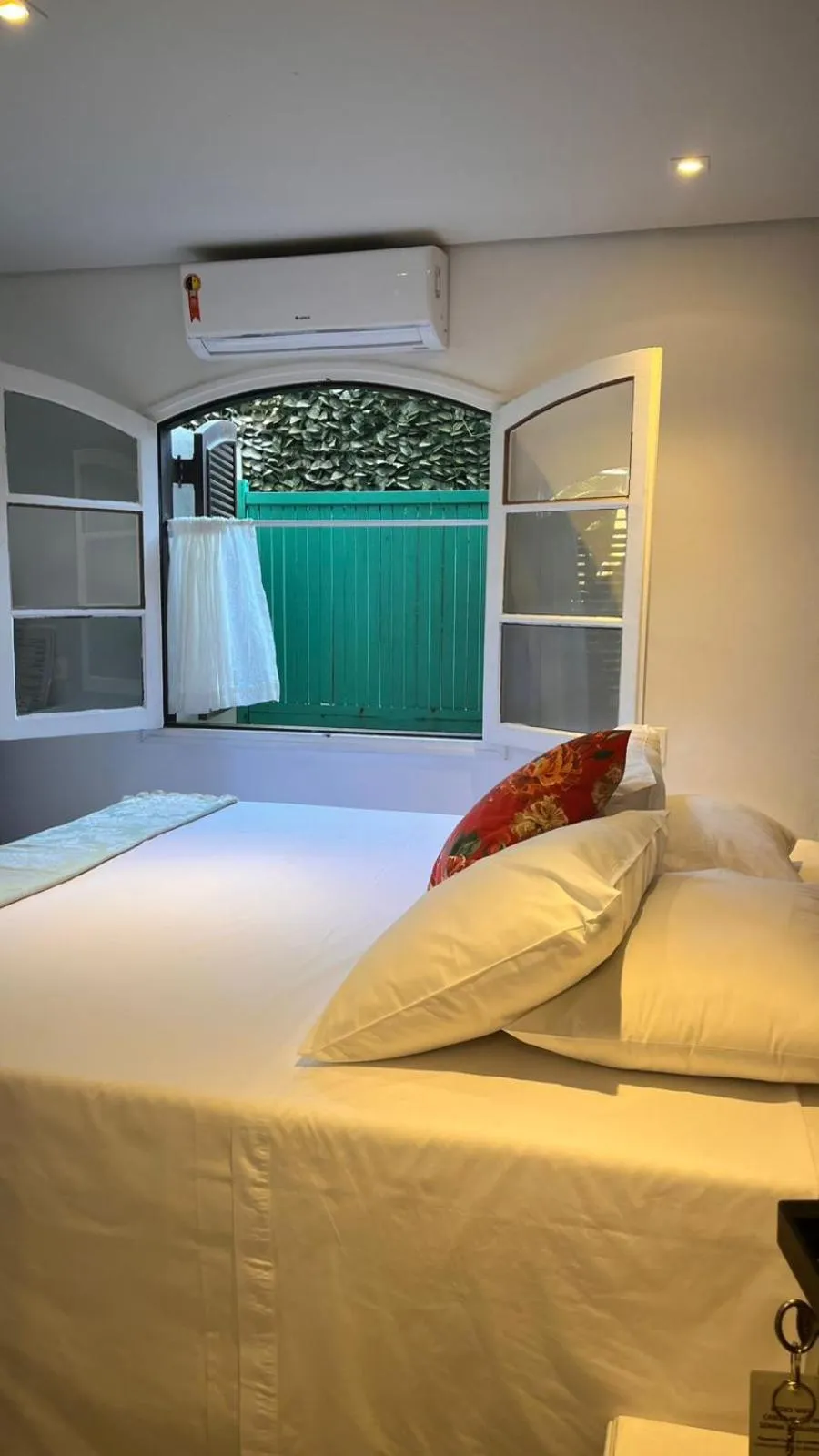 Bed in Pousada Canto do Camburi