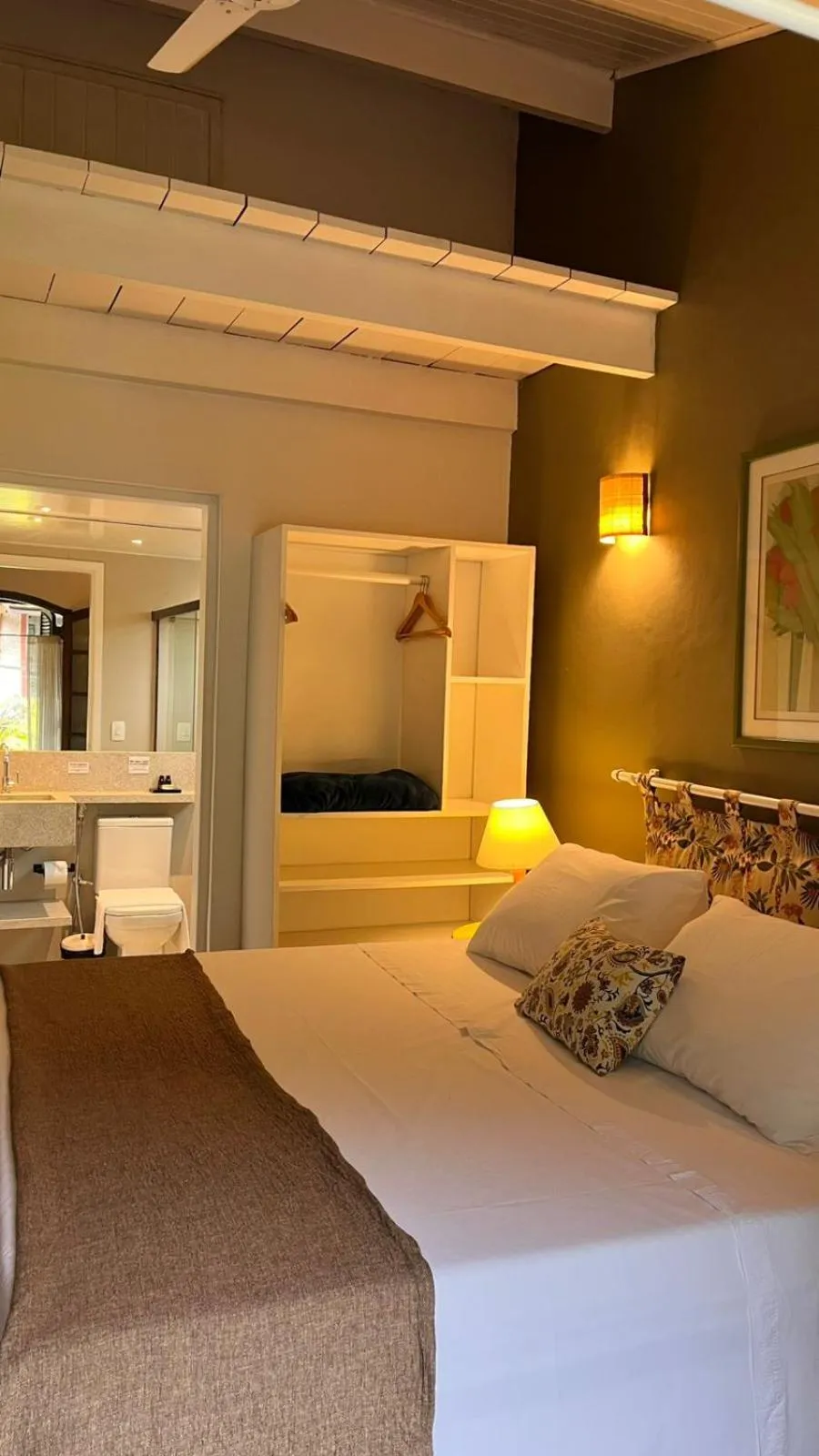 Bed in Pousada Canto do Camburi