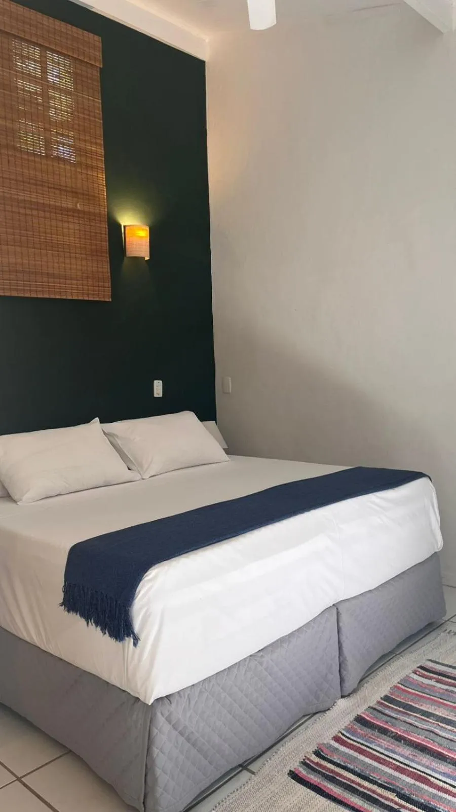 Bed in Pousada Canto do Camburi