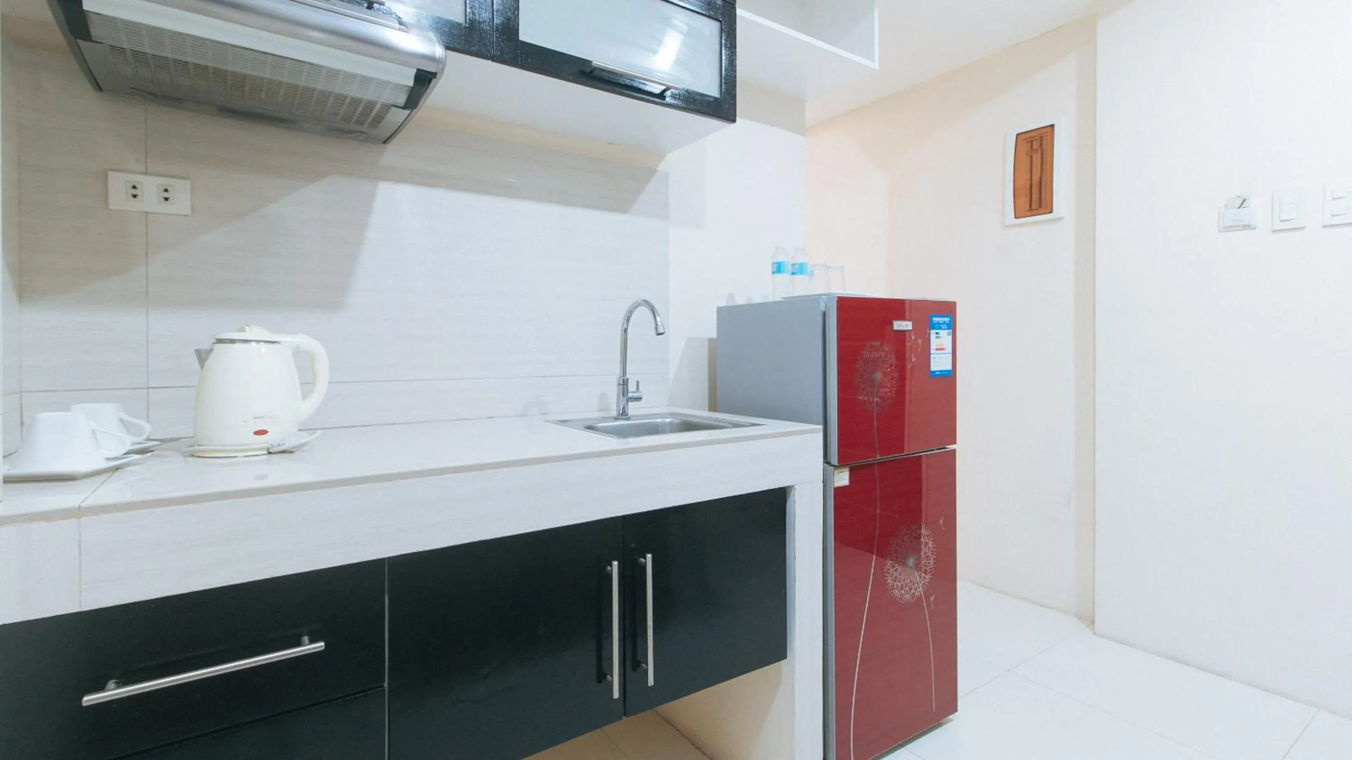 TV and multimedia in RedDoorz at Grand Apartelle Hernan Cortes Cebu