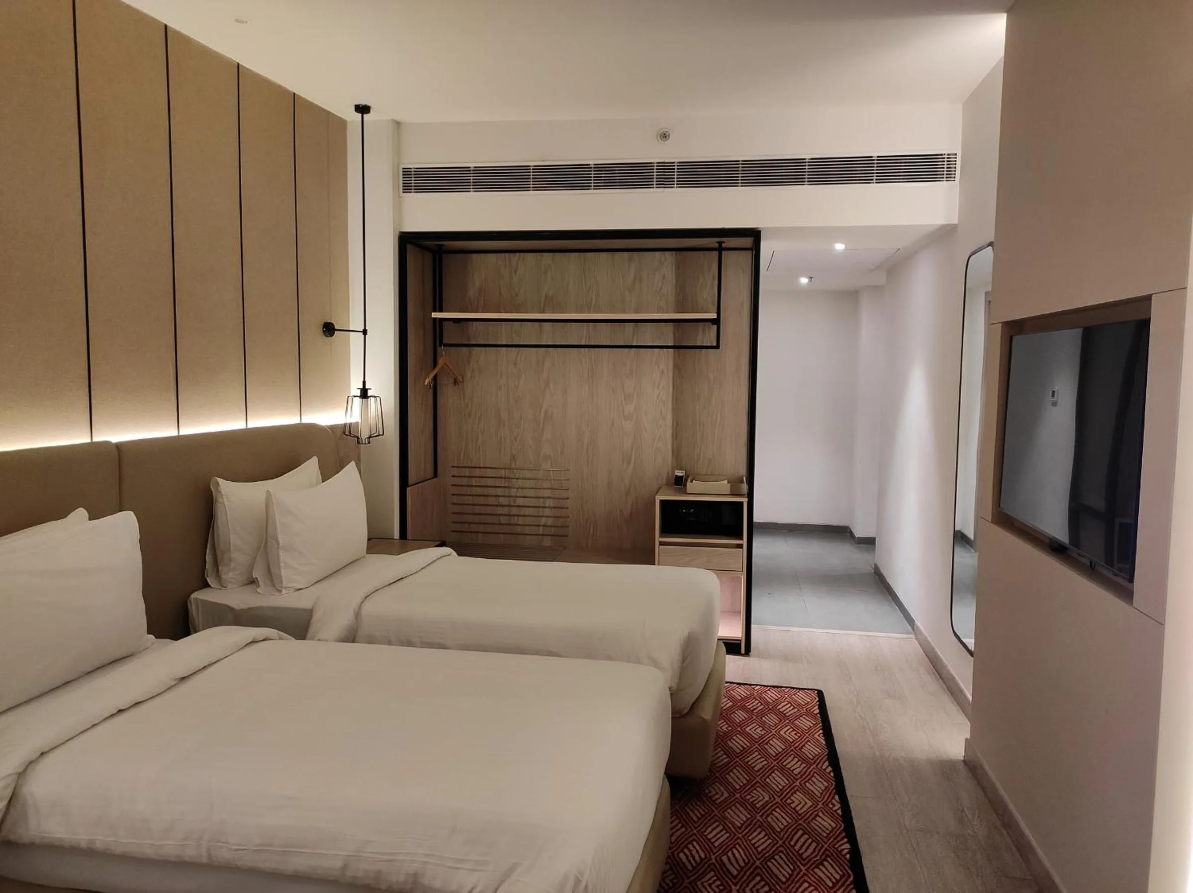 View (from property/room), Bed in Golden Tulip Lucknow