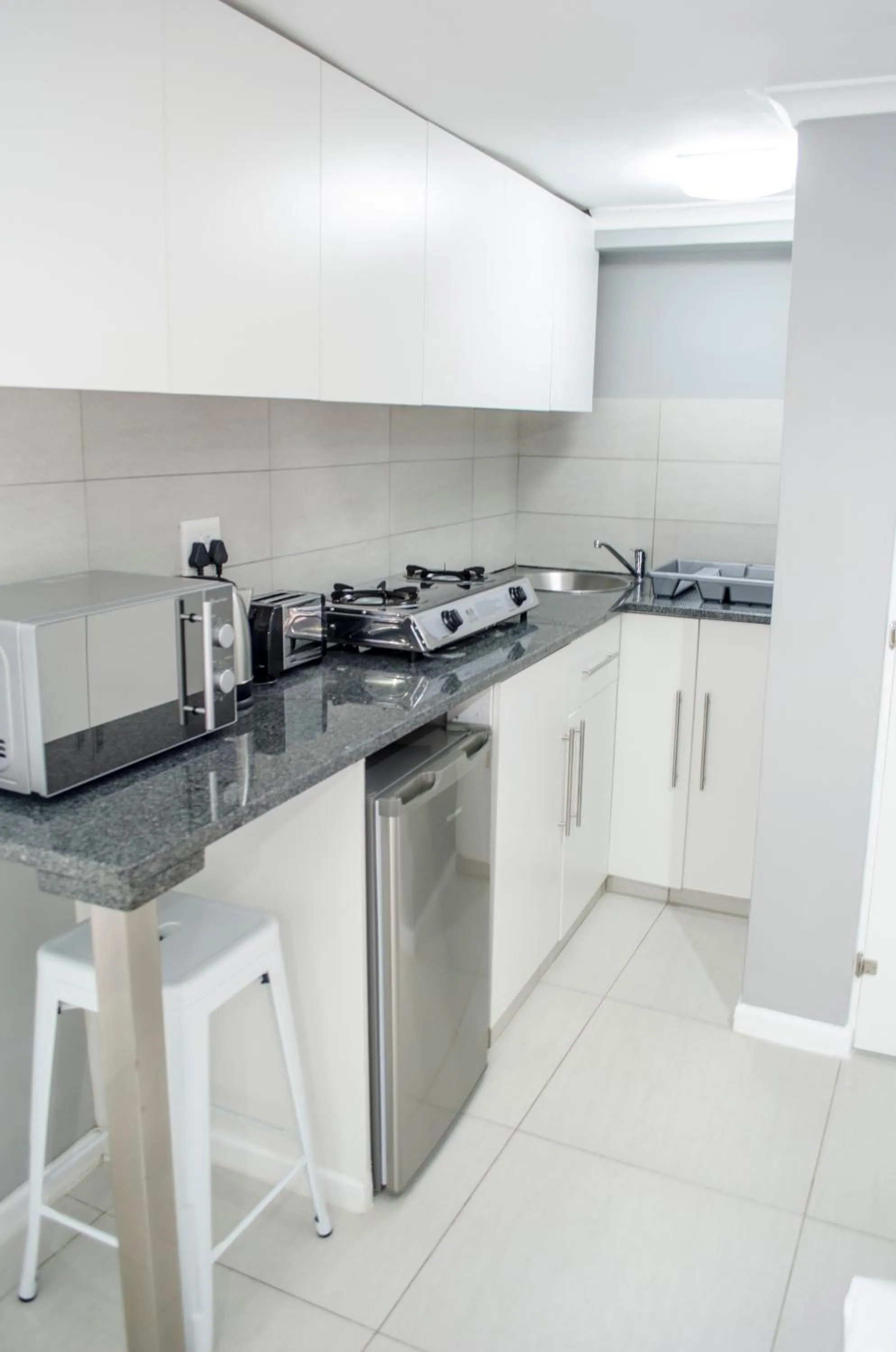 Kitchen or kitchenette in Cape Town Micro Apartments