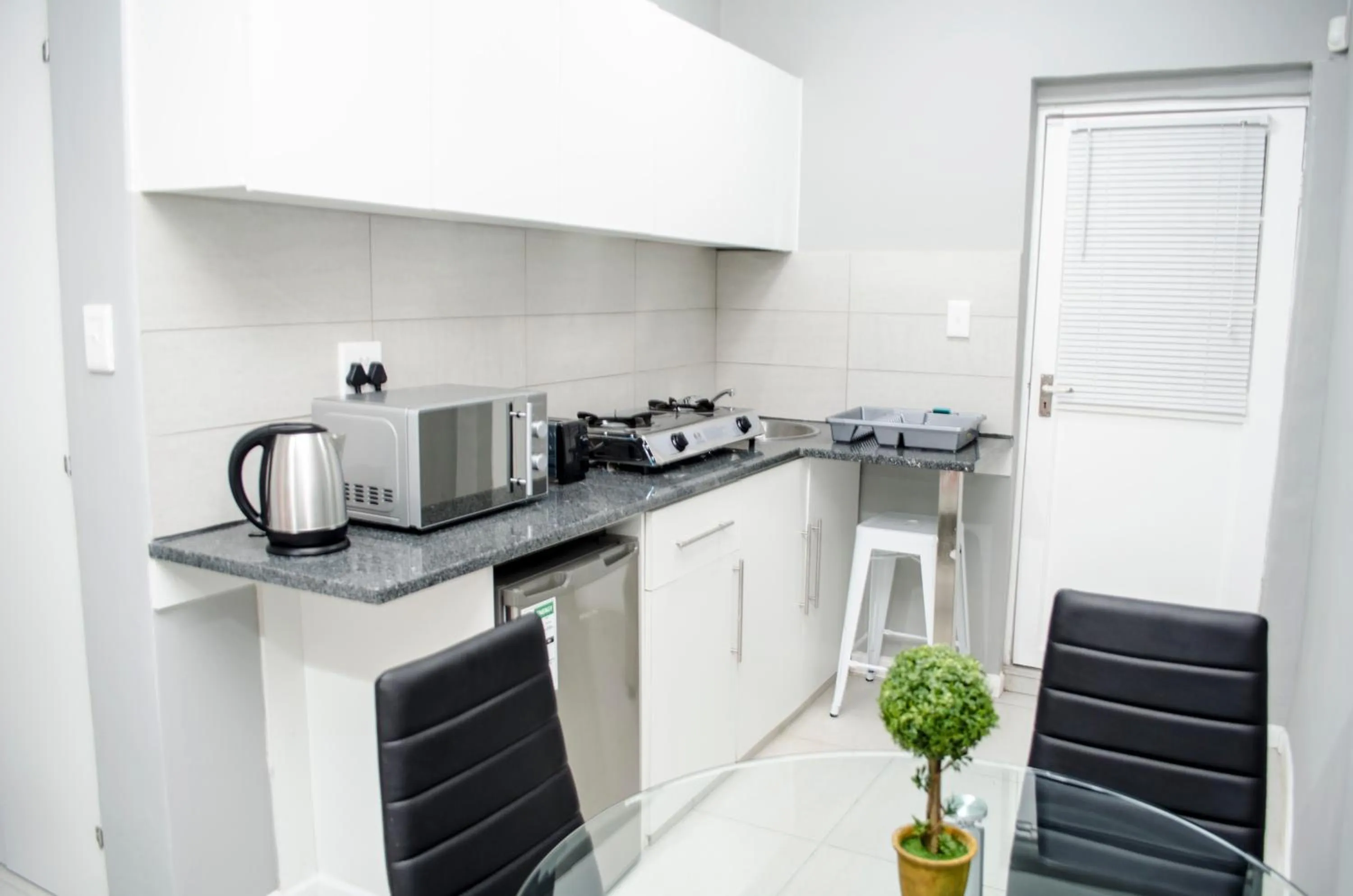 Kitchen or kitchenette in Cape Town Micro Apartments