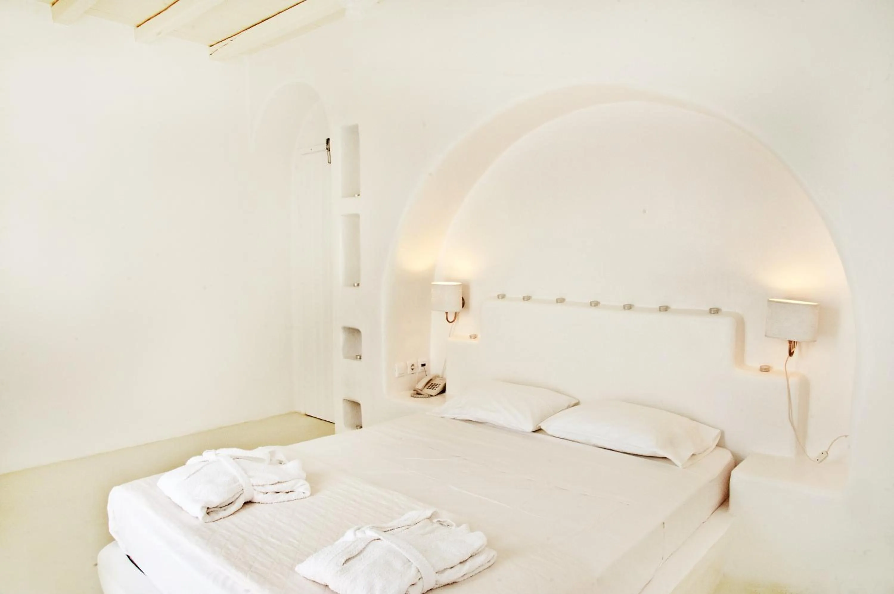 Bed in Altana Boutique Hotel