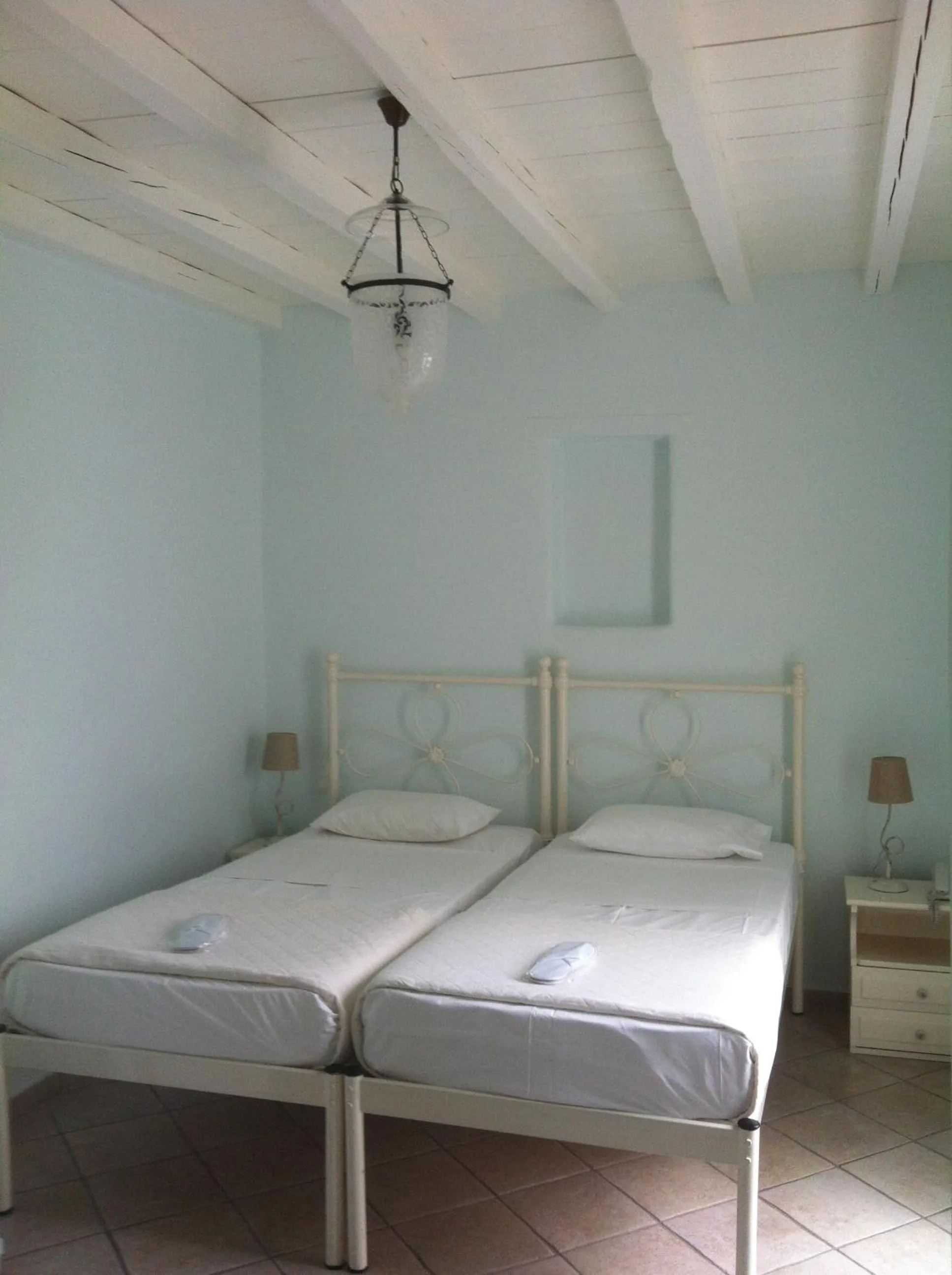 Bed in Altana Boutique Hotel