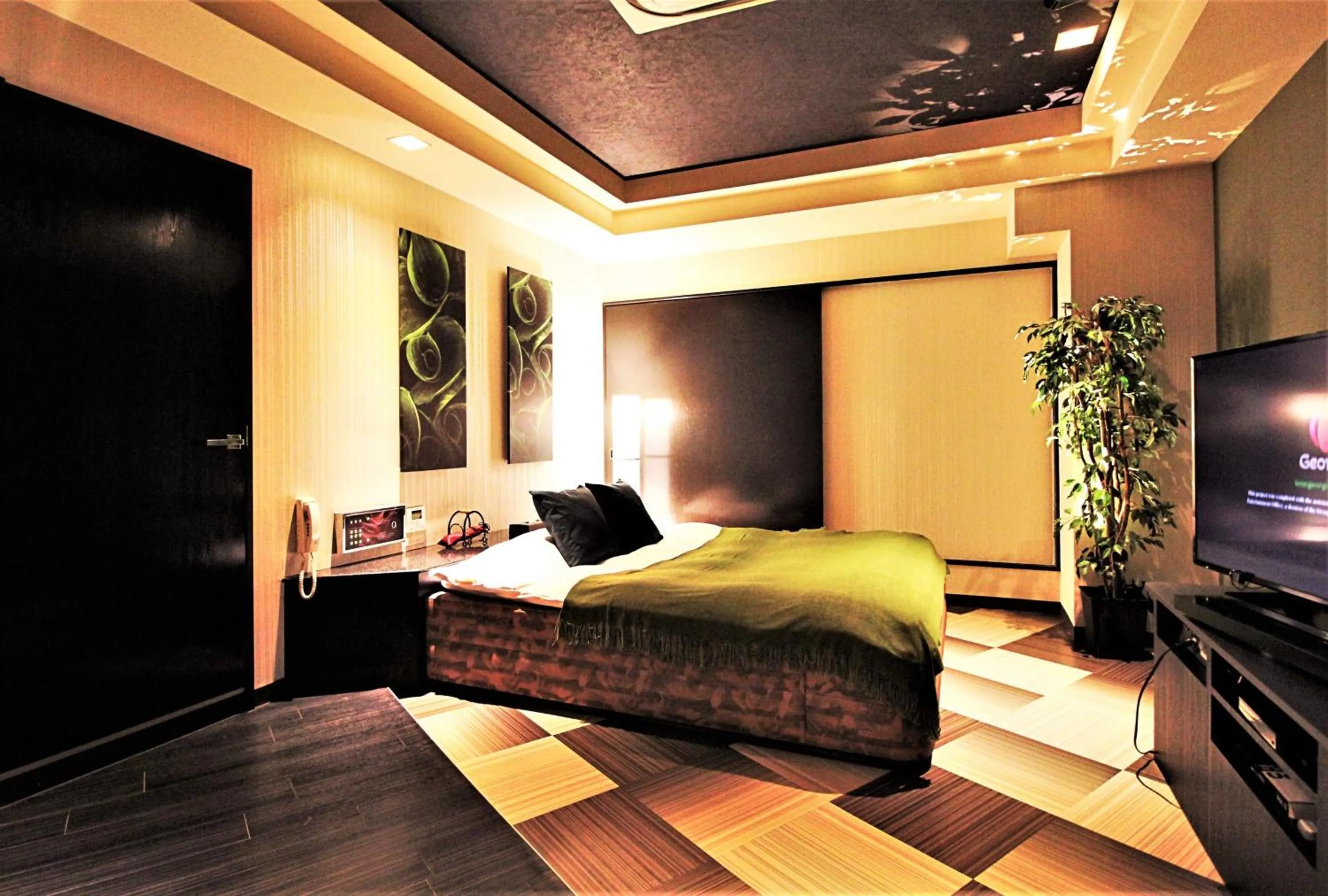 Bed in HOTEL O2 -全室人工ラドン温泉-Adult only