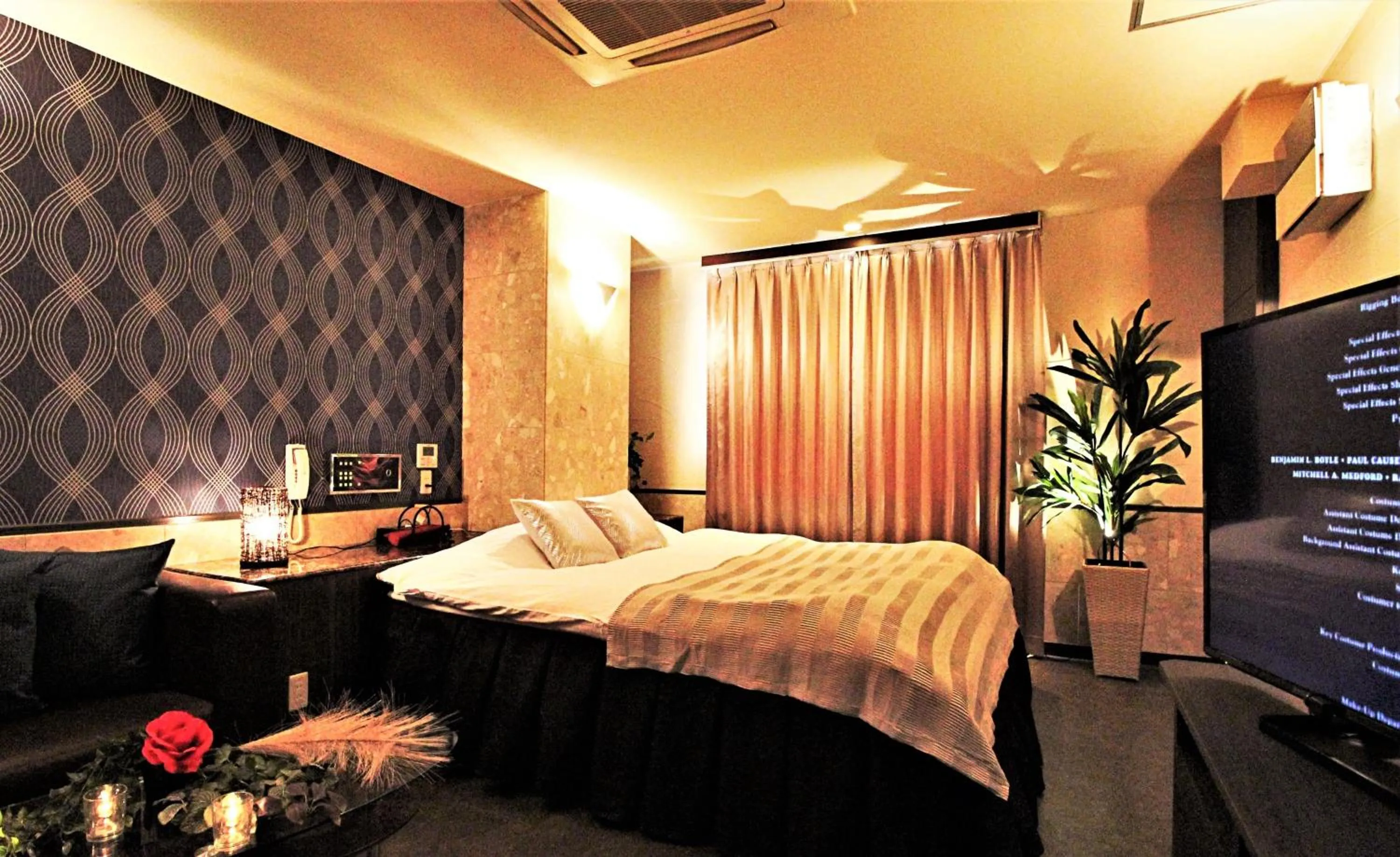 Bed in HOTEL O2 -全室人工ラドン温泉-Adult only