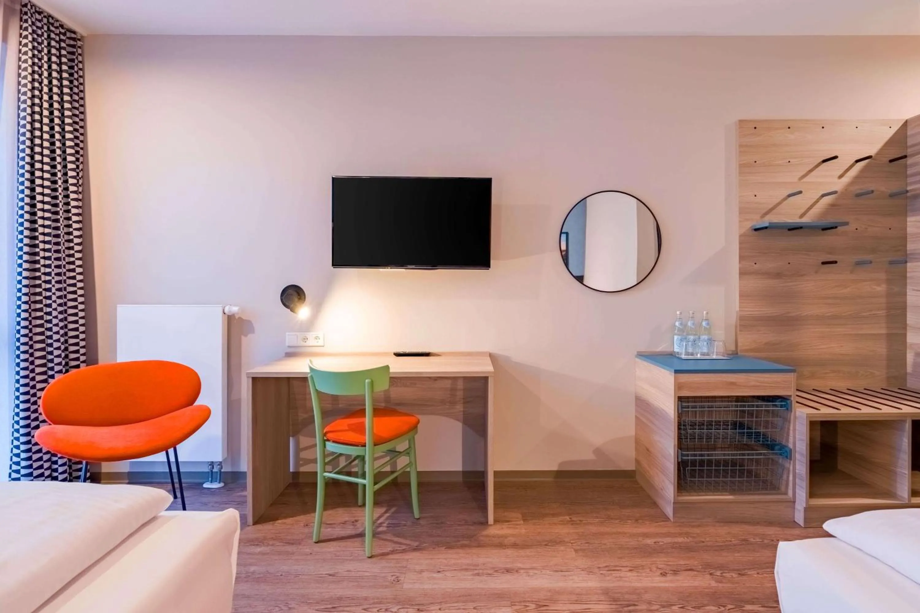 Photo of the whole room in Ramada Encore by Wyndham Munich Messe