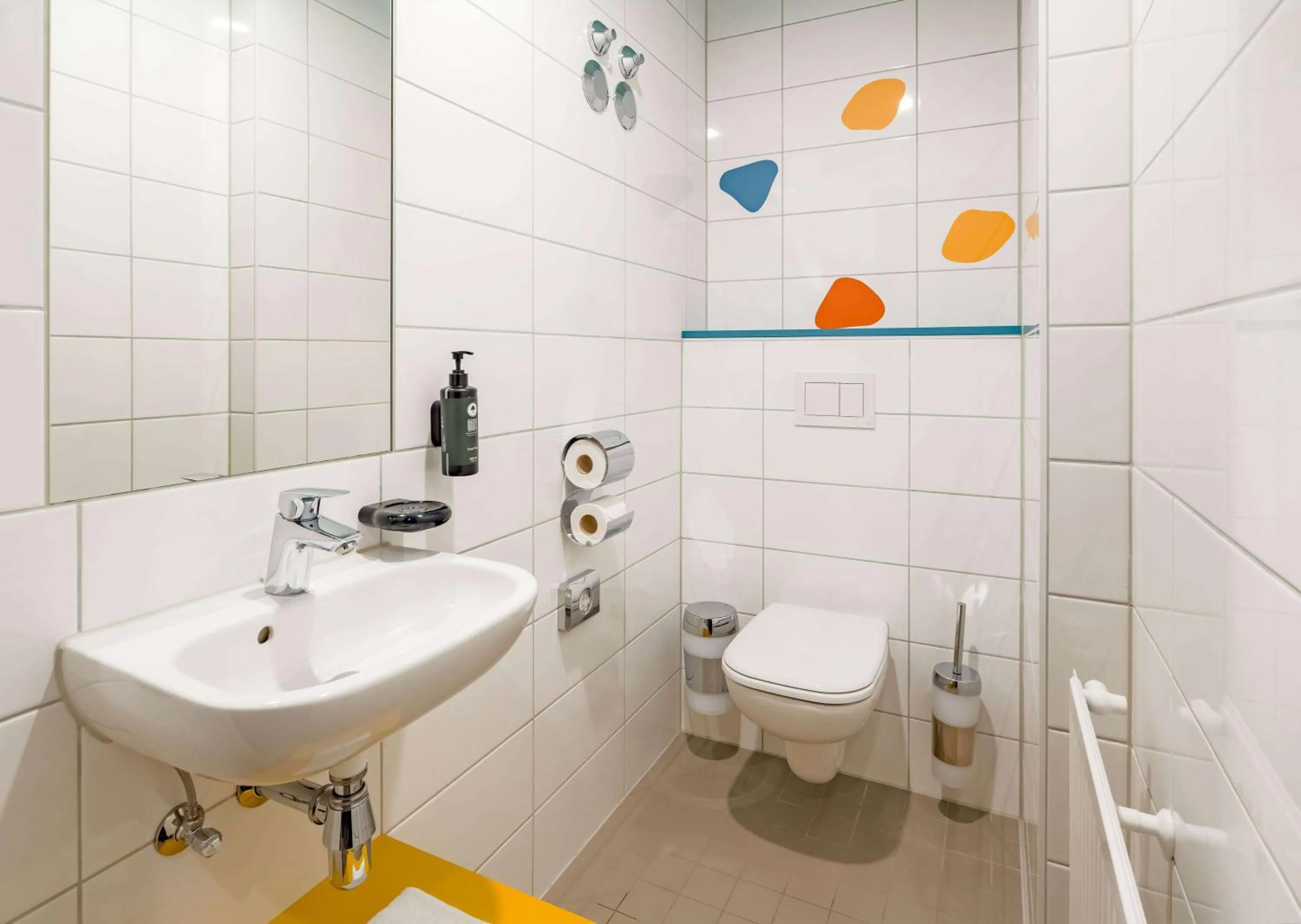 Toilet in Ramada Encore by Wyndham Munich Messe