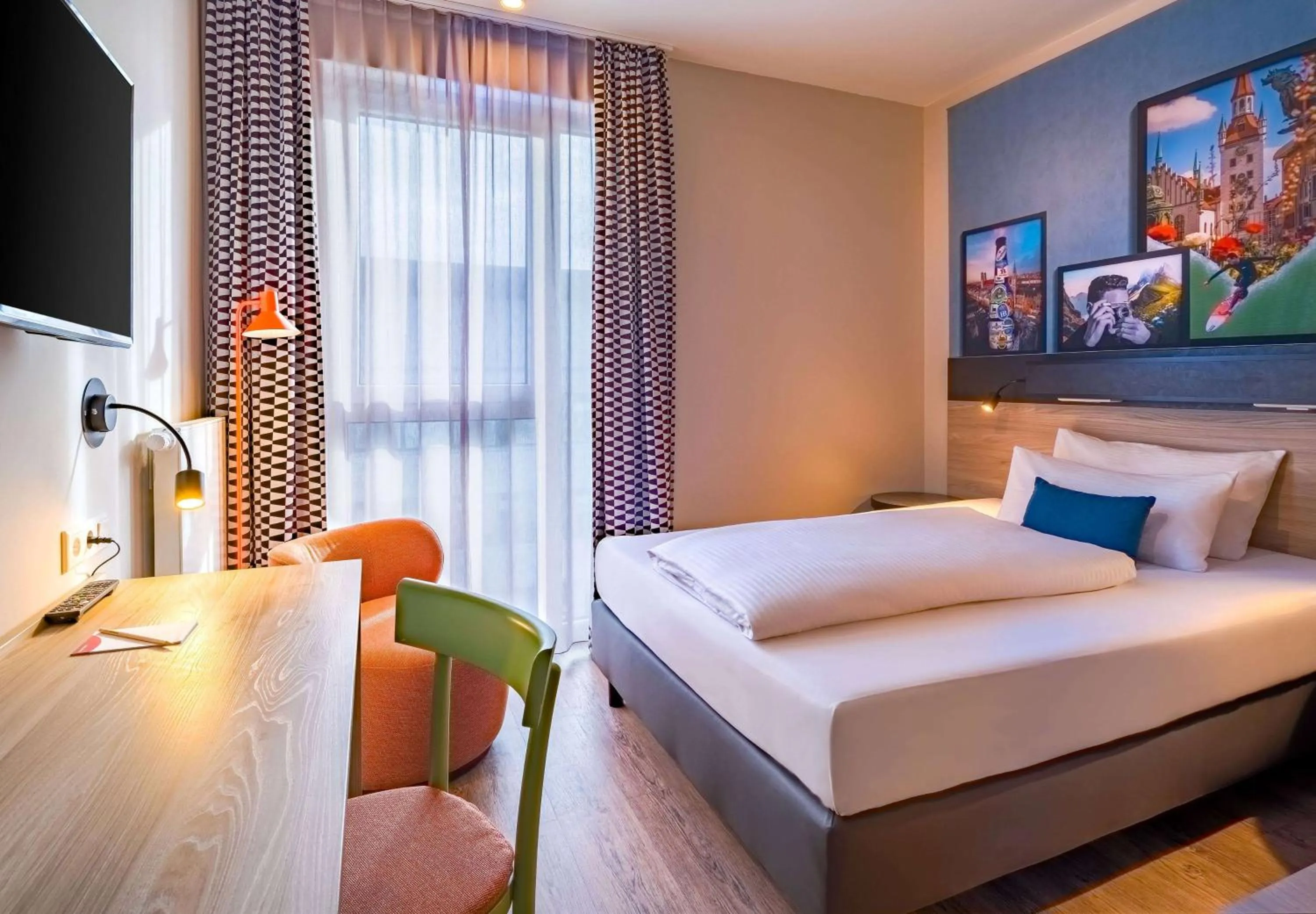 Photo of the whole room, Bed in Ramada Encore by Wyndham Munich Messe