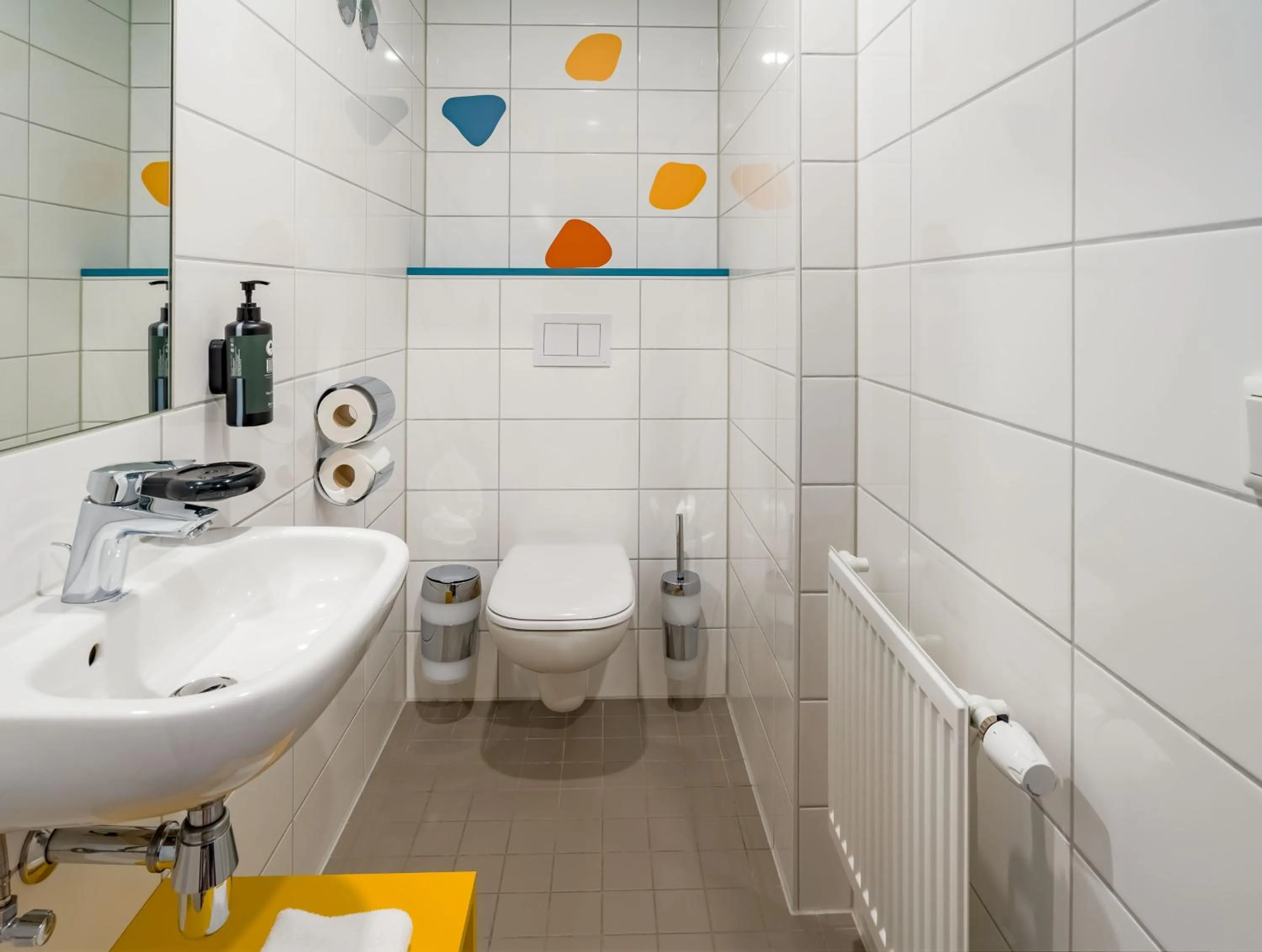 Toilet in Ramada Encore by Wyndham Munich Messe