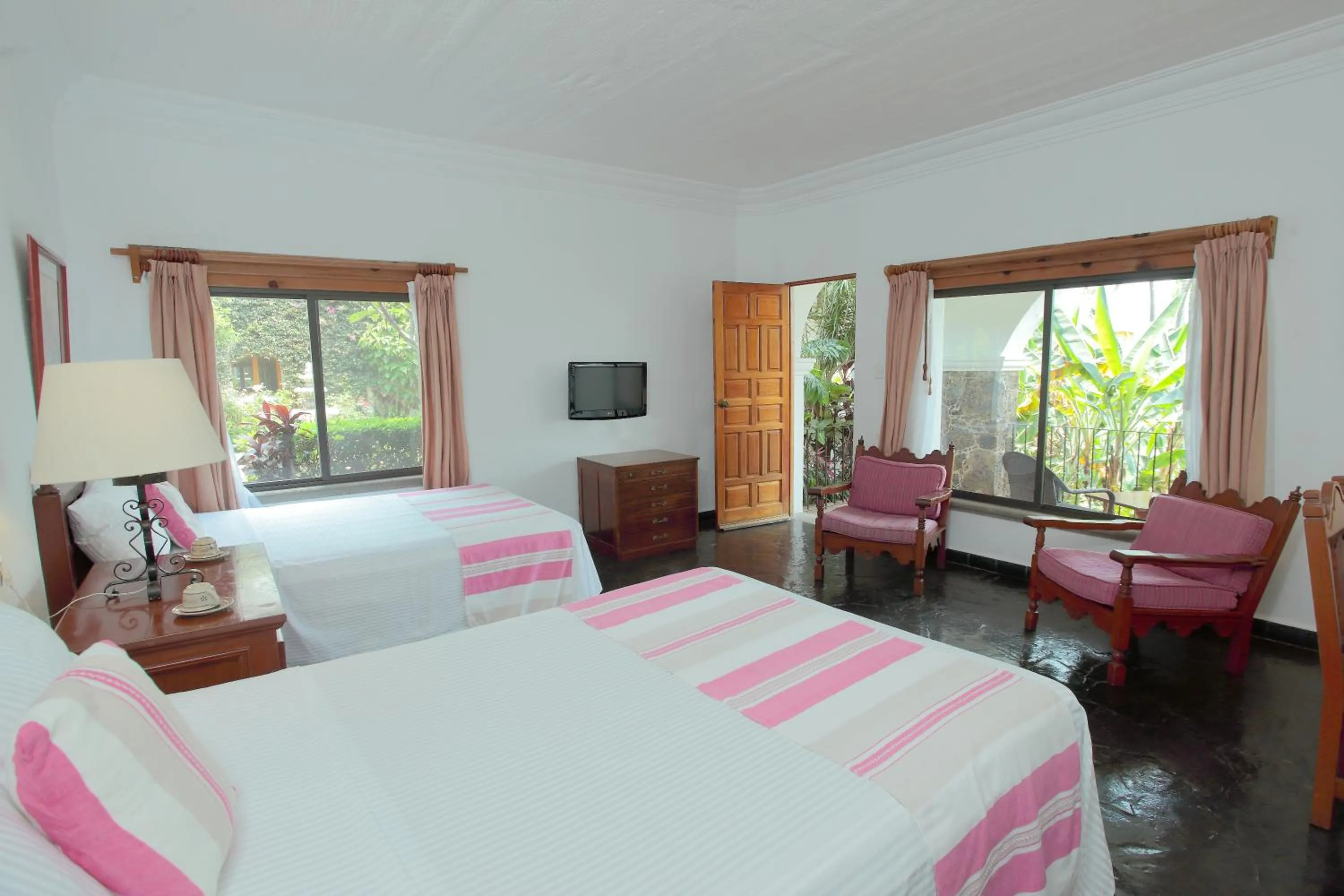 Photo of the whole room, Bed in Posada del Tepozteco - Hotel & Gallery