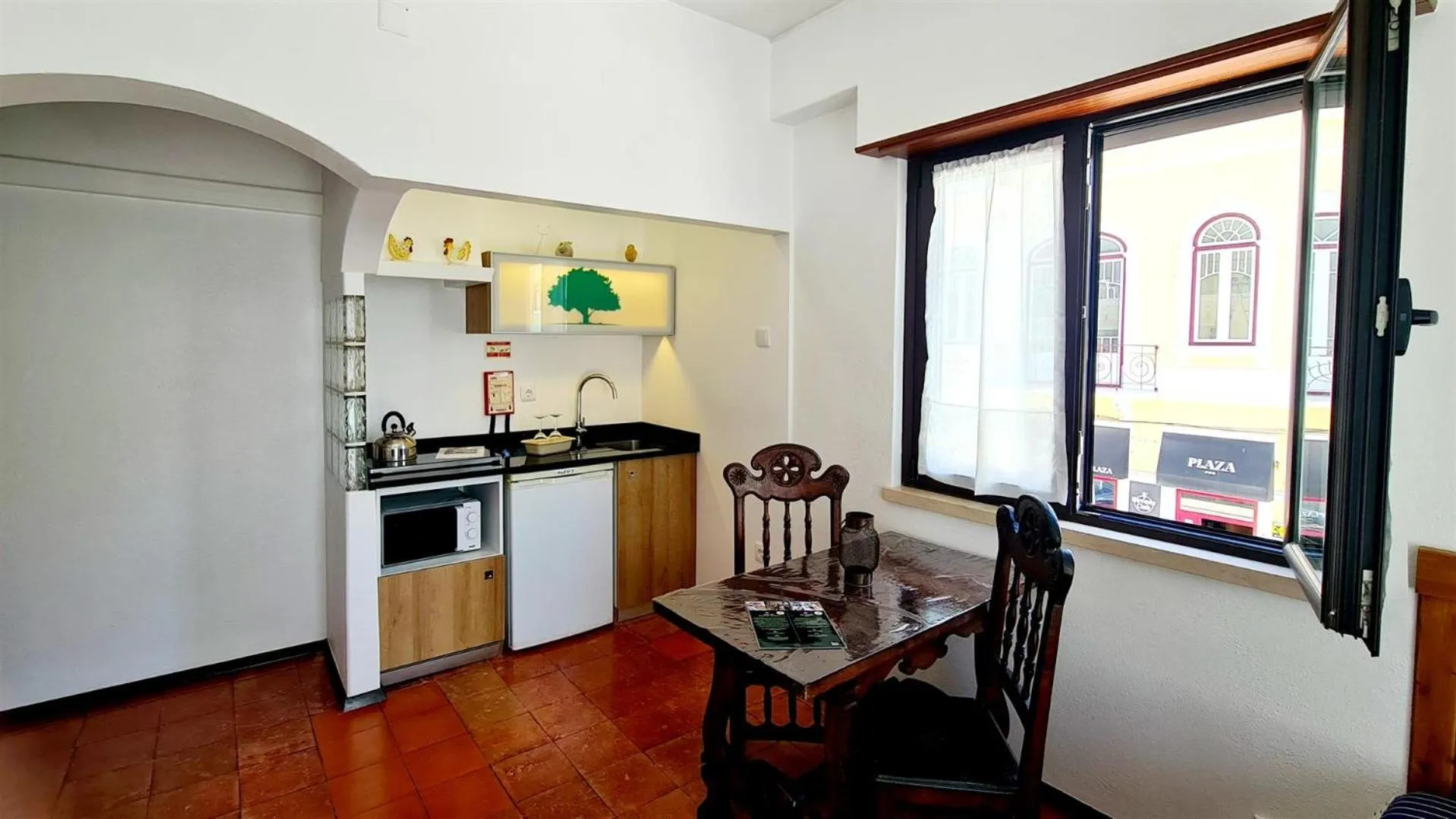 Kitchen or kitchenette in Solar dos Carvalhos - Apartamentos de Turismo