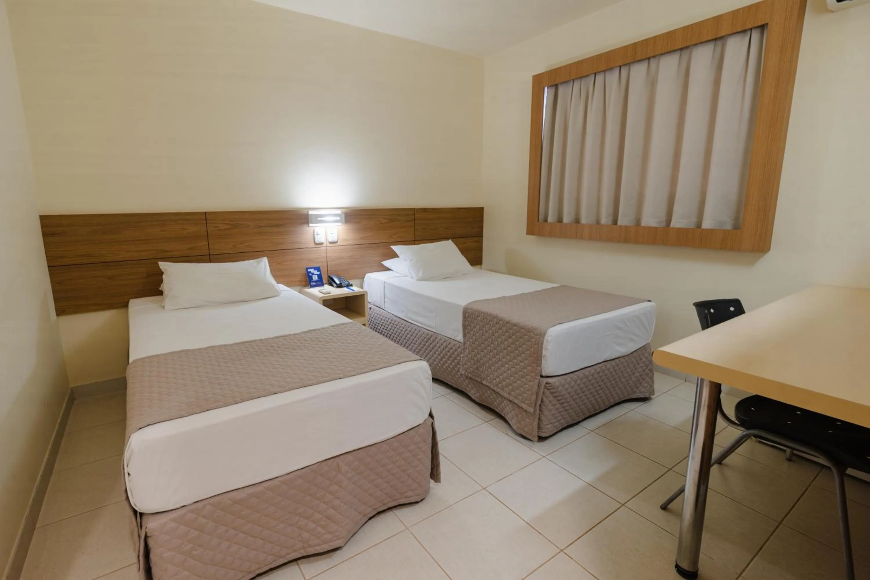 Photo of the whole room, Bed in Hotel Caiuá Express