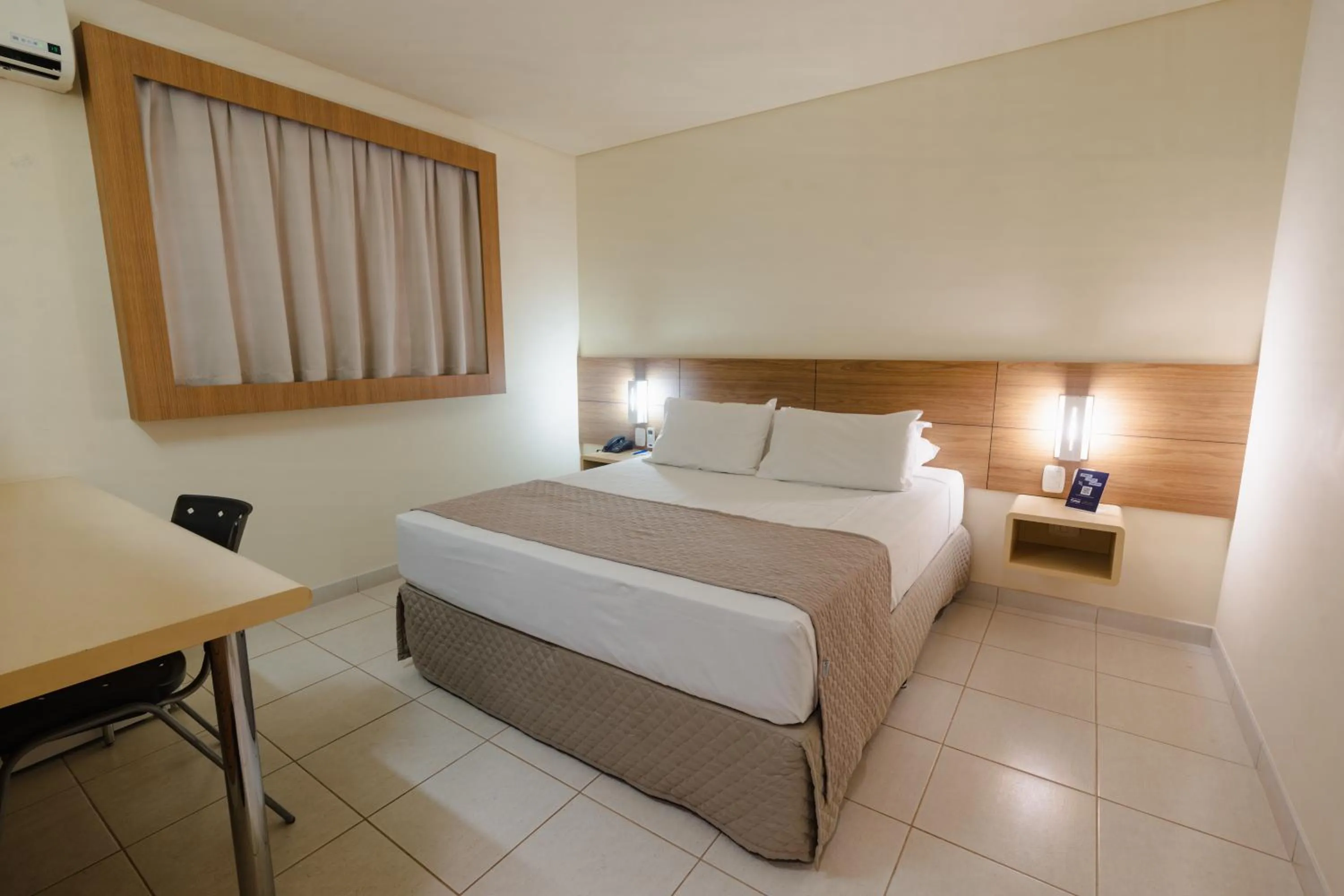 Photo of the whole room, Bed in Hotel Caiuá Express