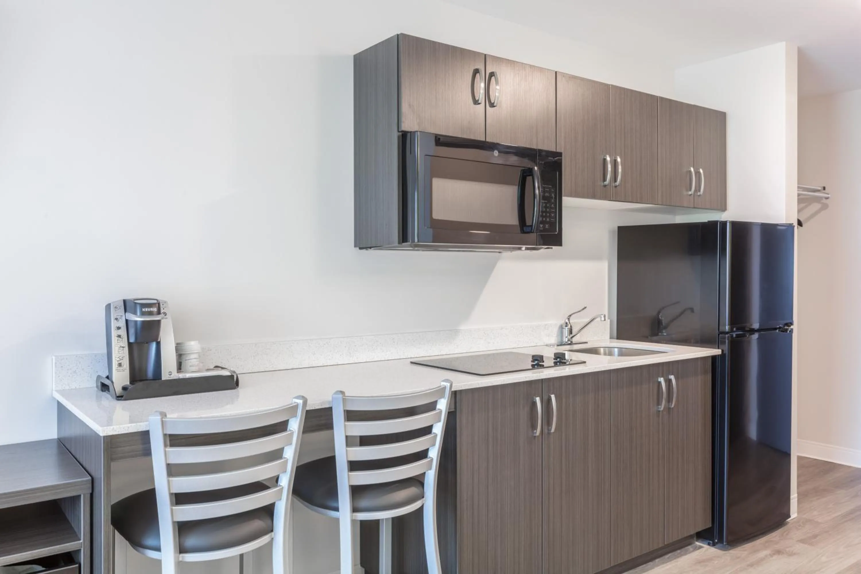 Kitchen or kitchenette in Super 8 by Wyndham Winnipeg East MB