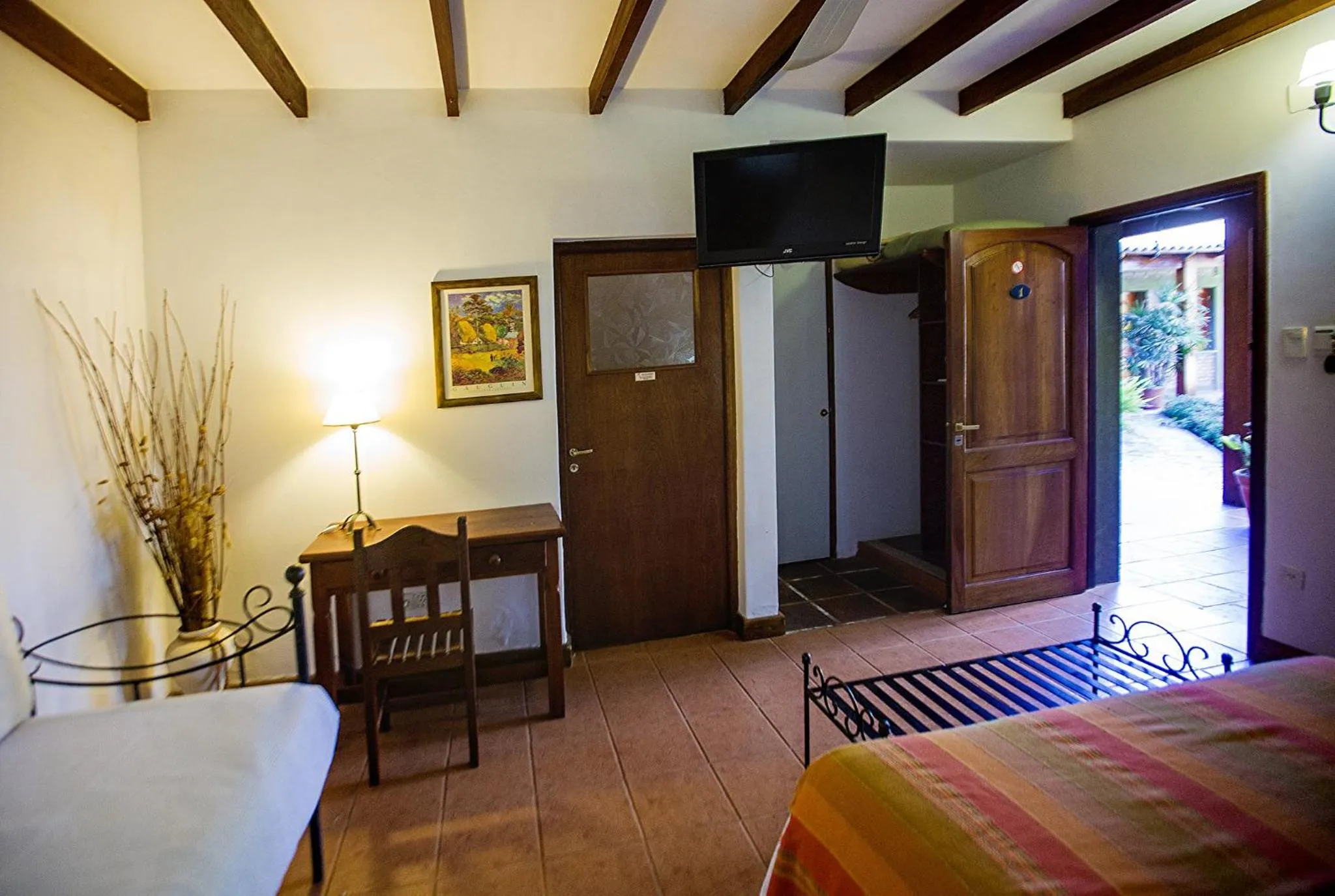 Bed in Hostería Posada del Sol