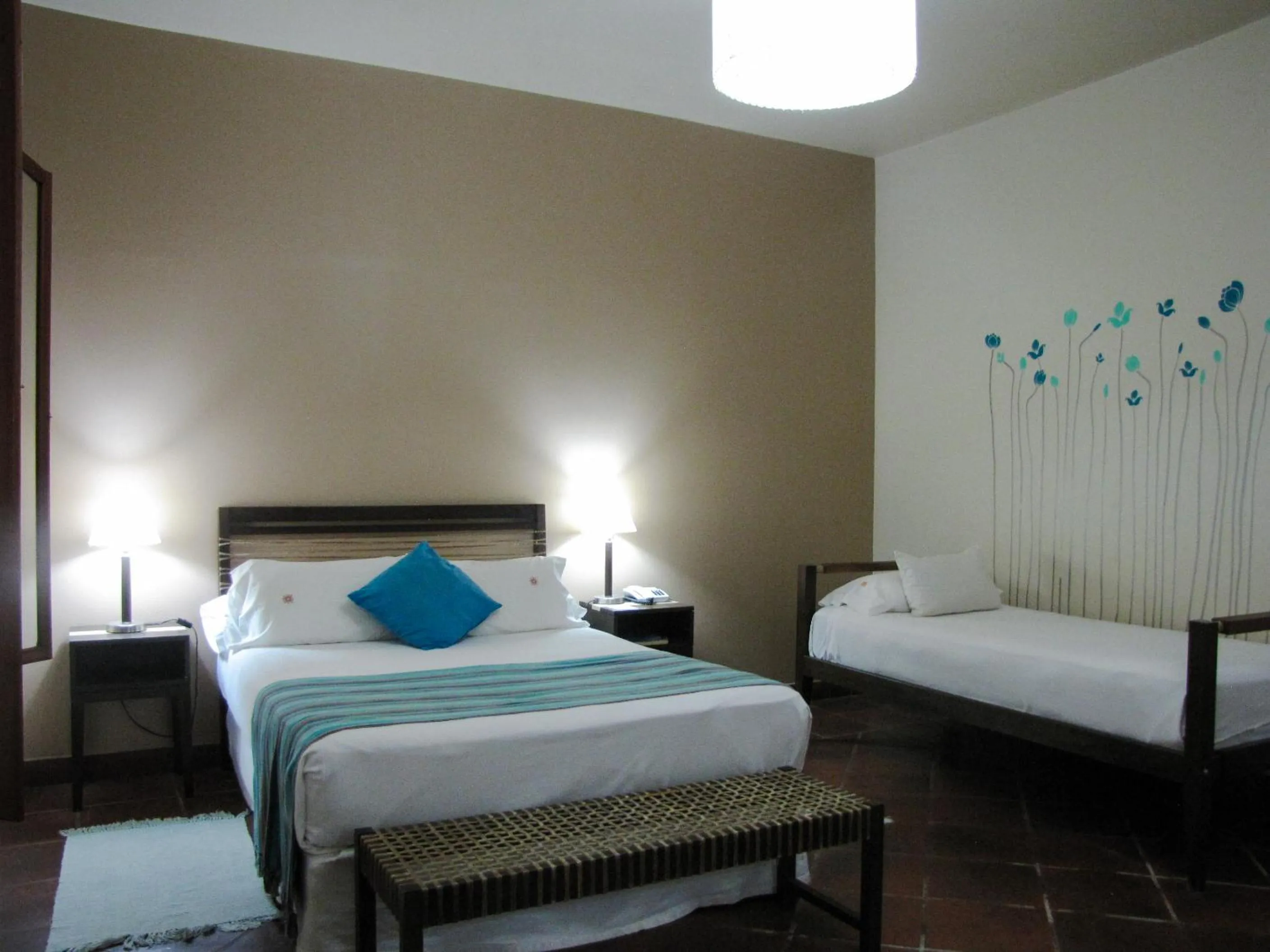 Bed in Hostería Posada del Sol