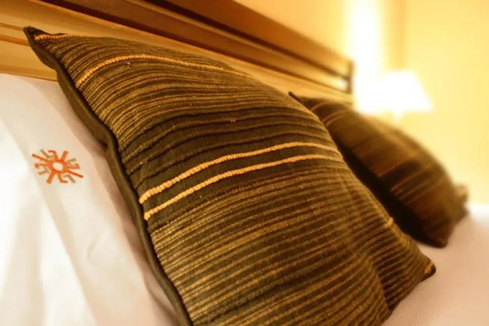 Bed in Hostería Posada del Sol