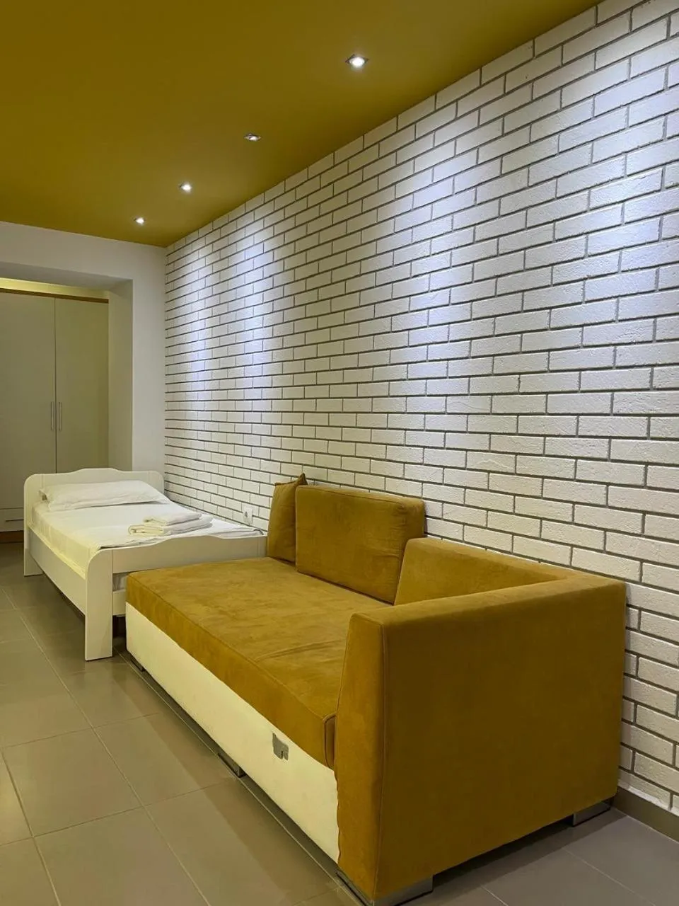 Bed in Sunrise Luxury Apartments