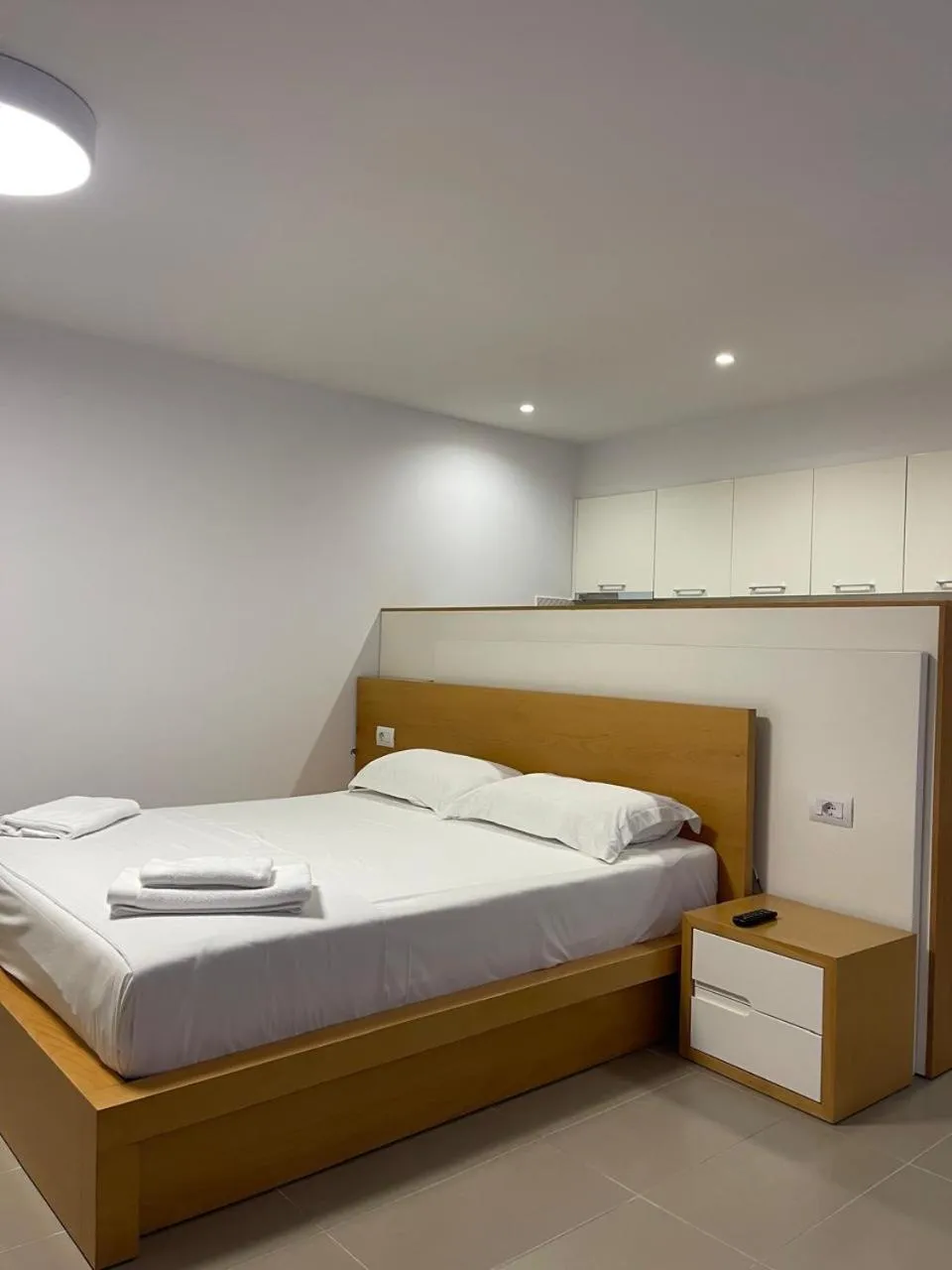 Bed in Sunrise Luxury Apartments