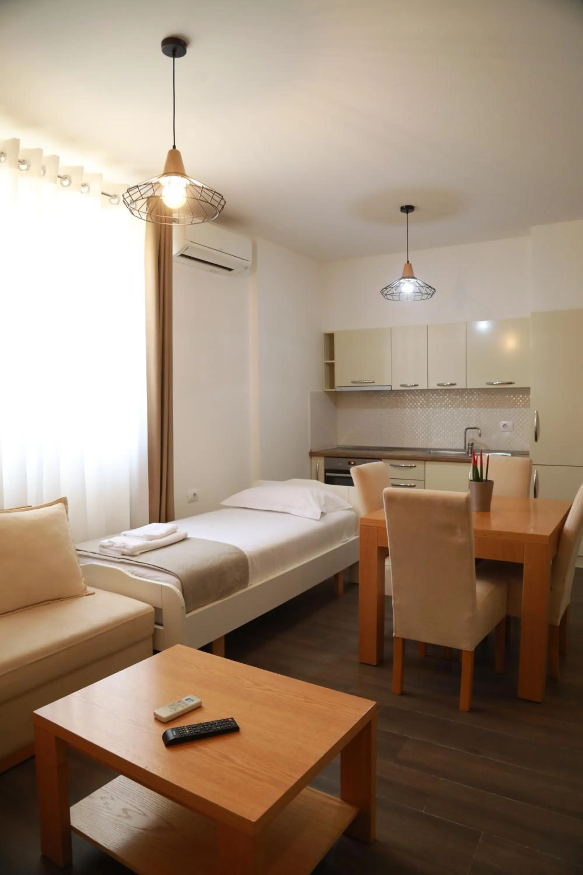 Bed in Sunrise Luxury Apartments