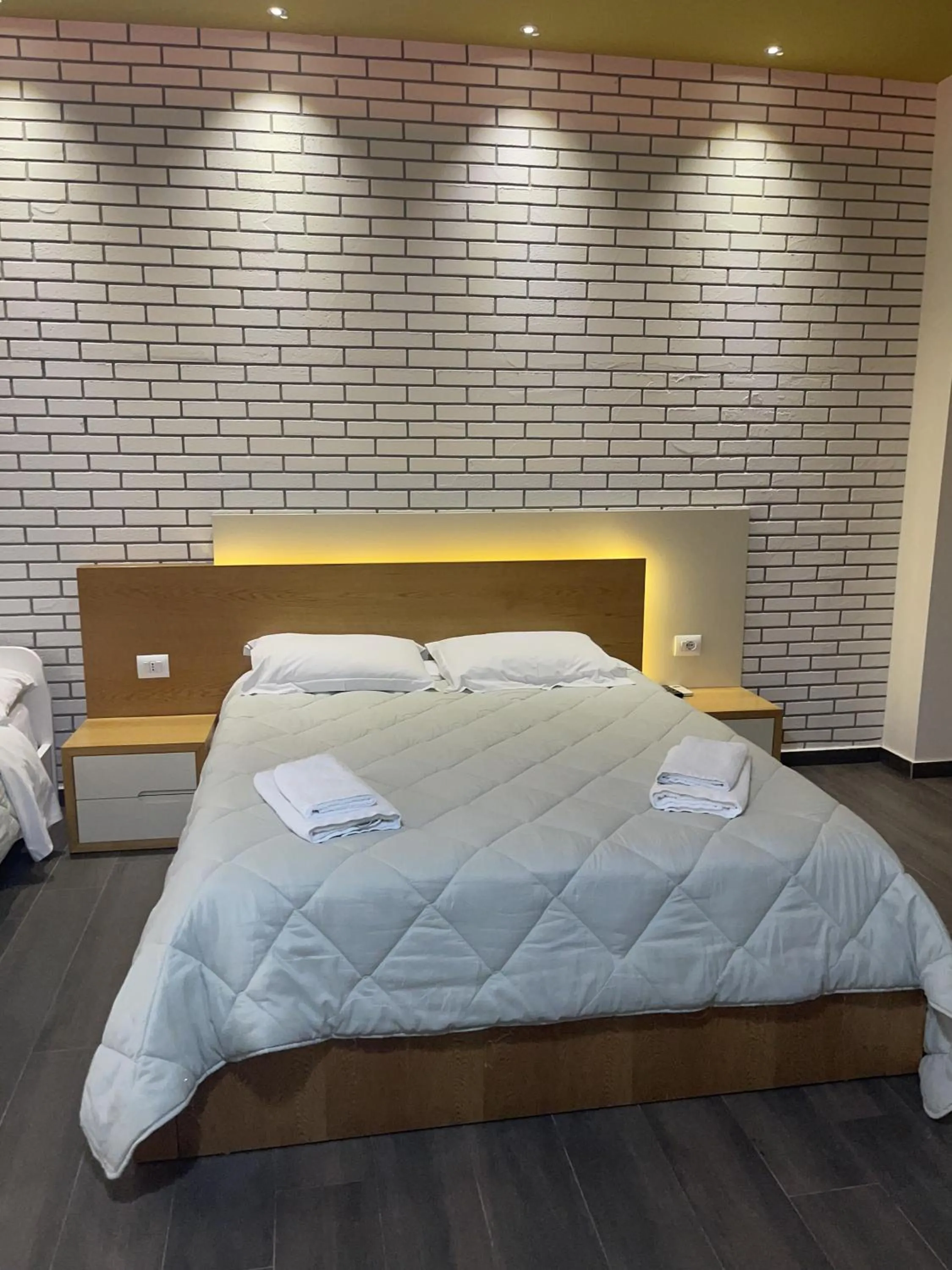 Bed in Sunrise Luxury Apartments