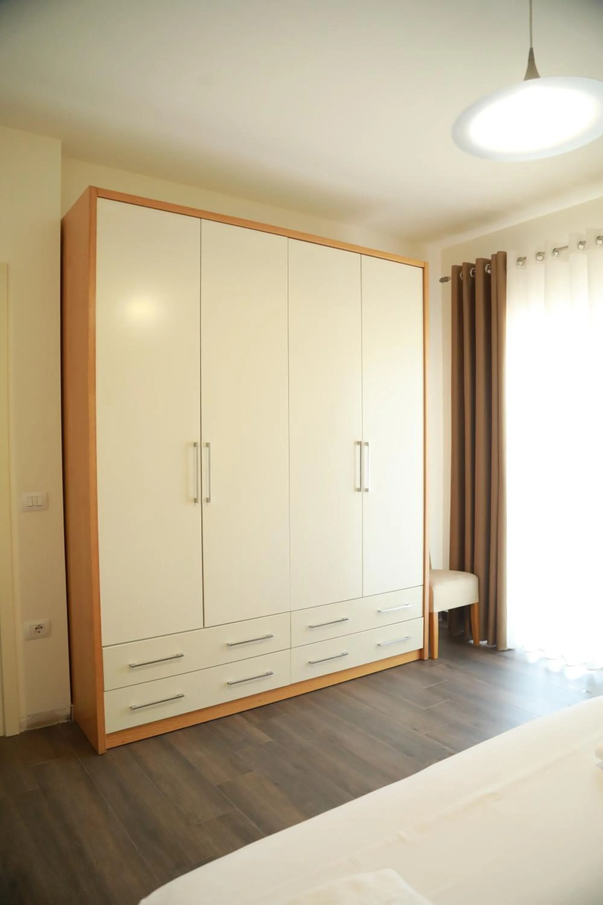 Bed in Sunrise Luxury Apartments