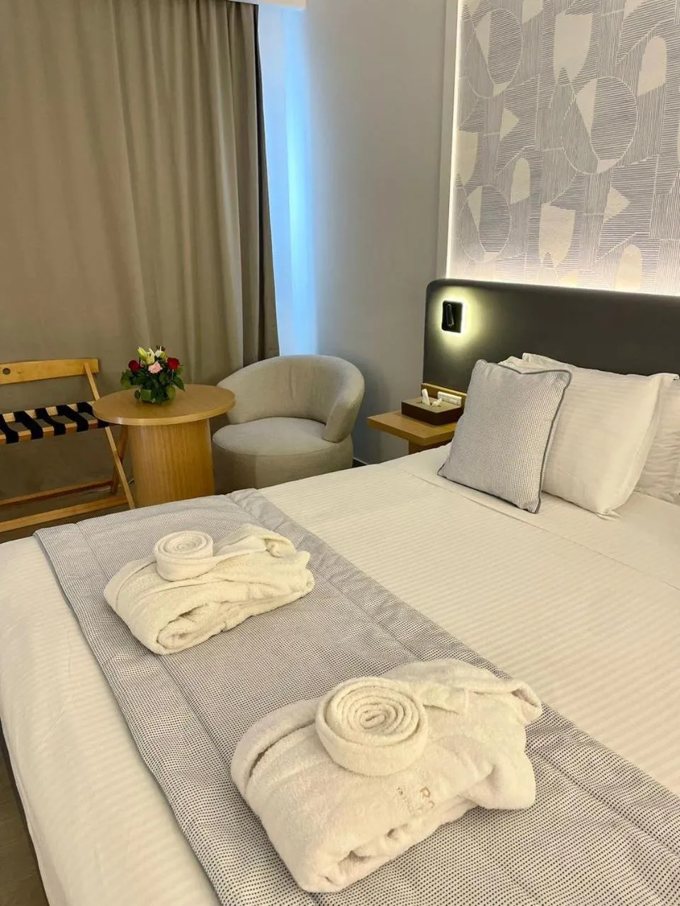 Bed in Royal Tulip Taj Sultan