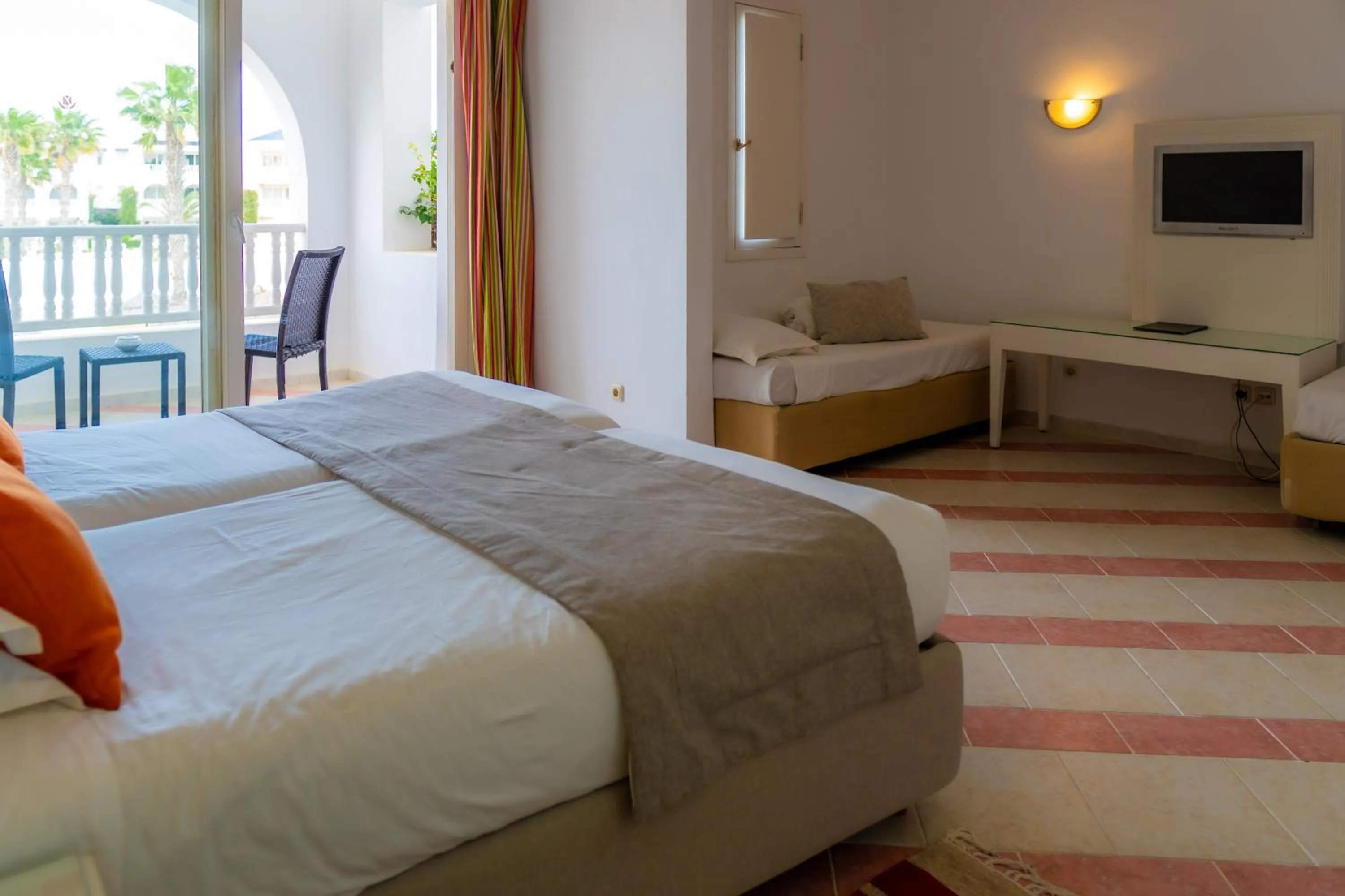 Bed in Royal Tulip Taj Sultan